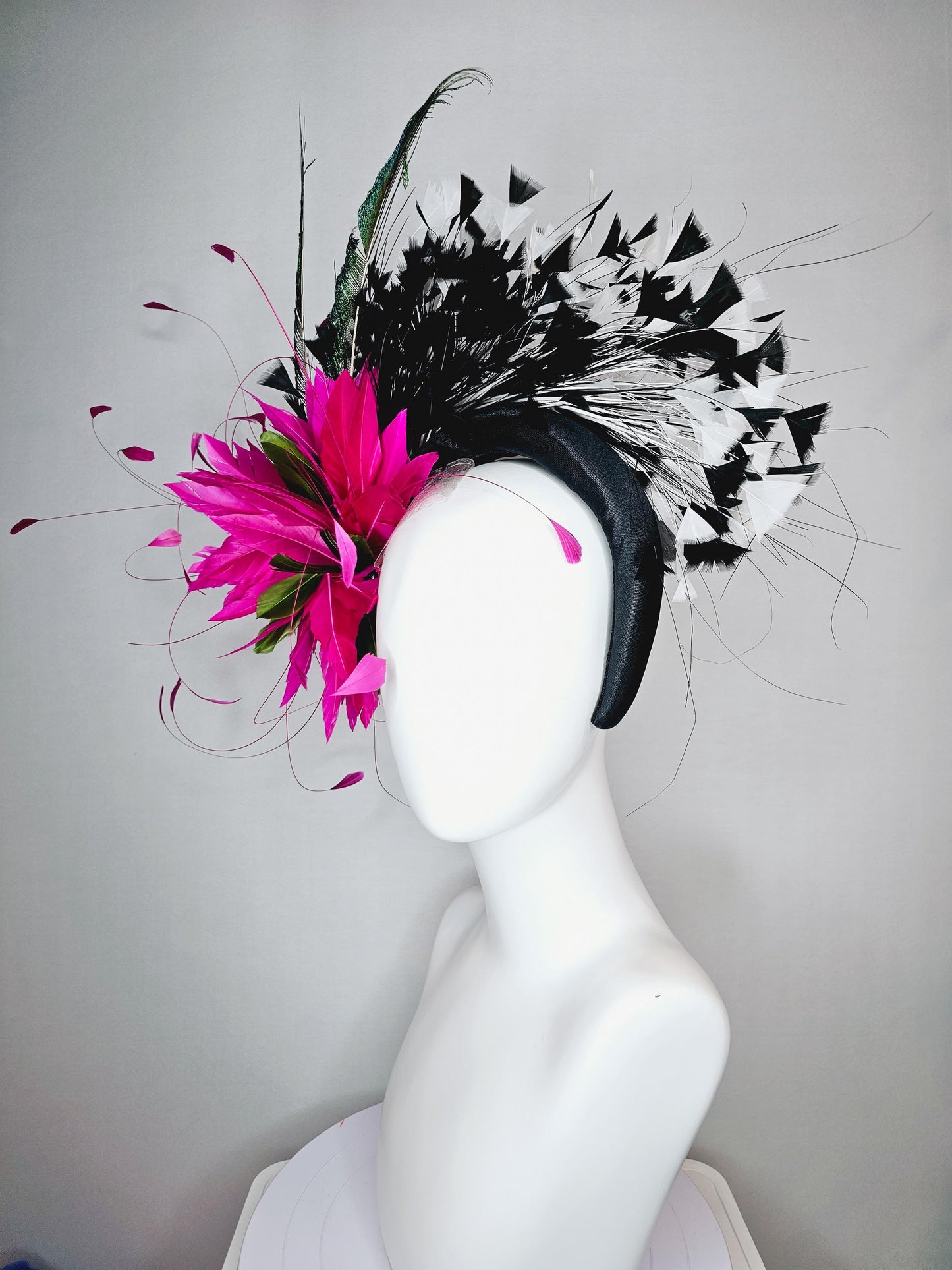 kentucky derby hat fascinator black satin headband with fuchsia pink feather flower green feathers and black and white branching feathers