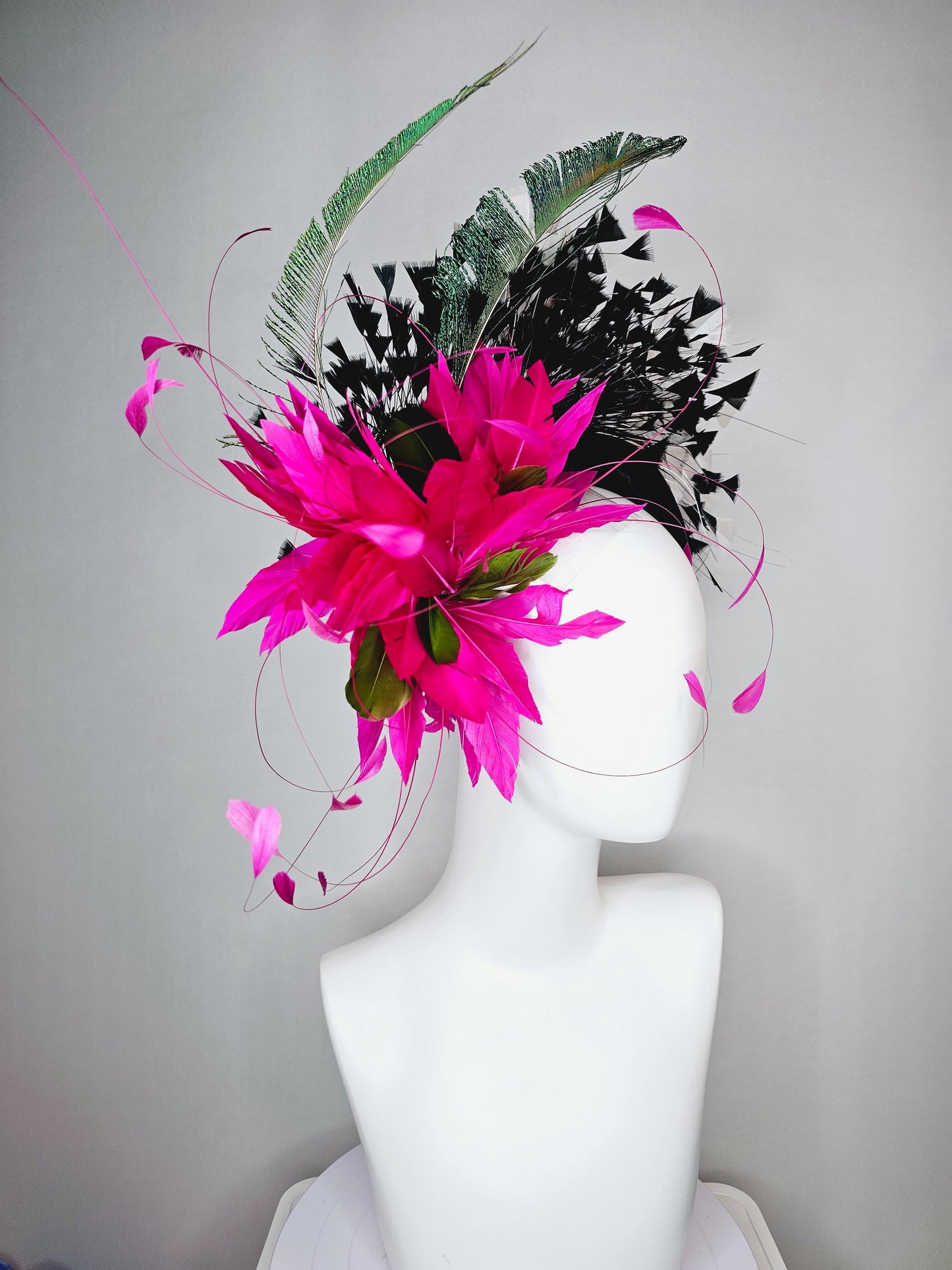 kentucky derby hat fascinator black satin headband with fuchsia pink feather flower green feathers and black and white branching feathers