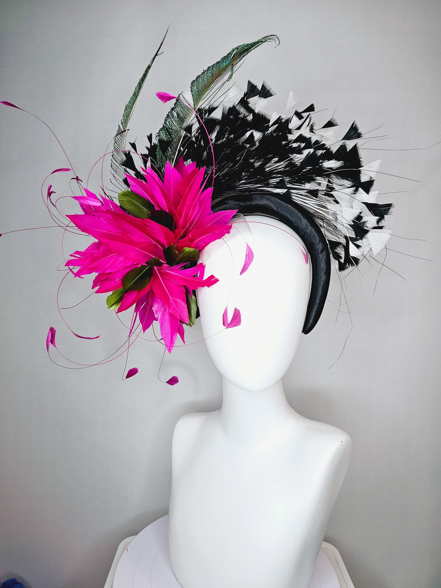 kentucky derby hat fascinator black satin headband with fuchsia pink feather flower green feathers and black and white branching feathers