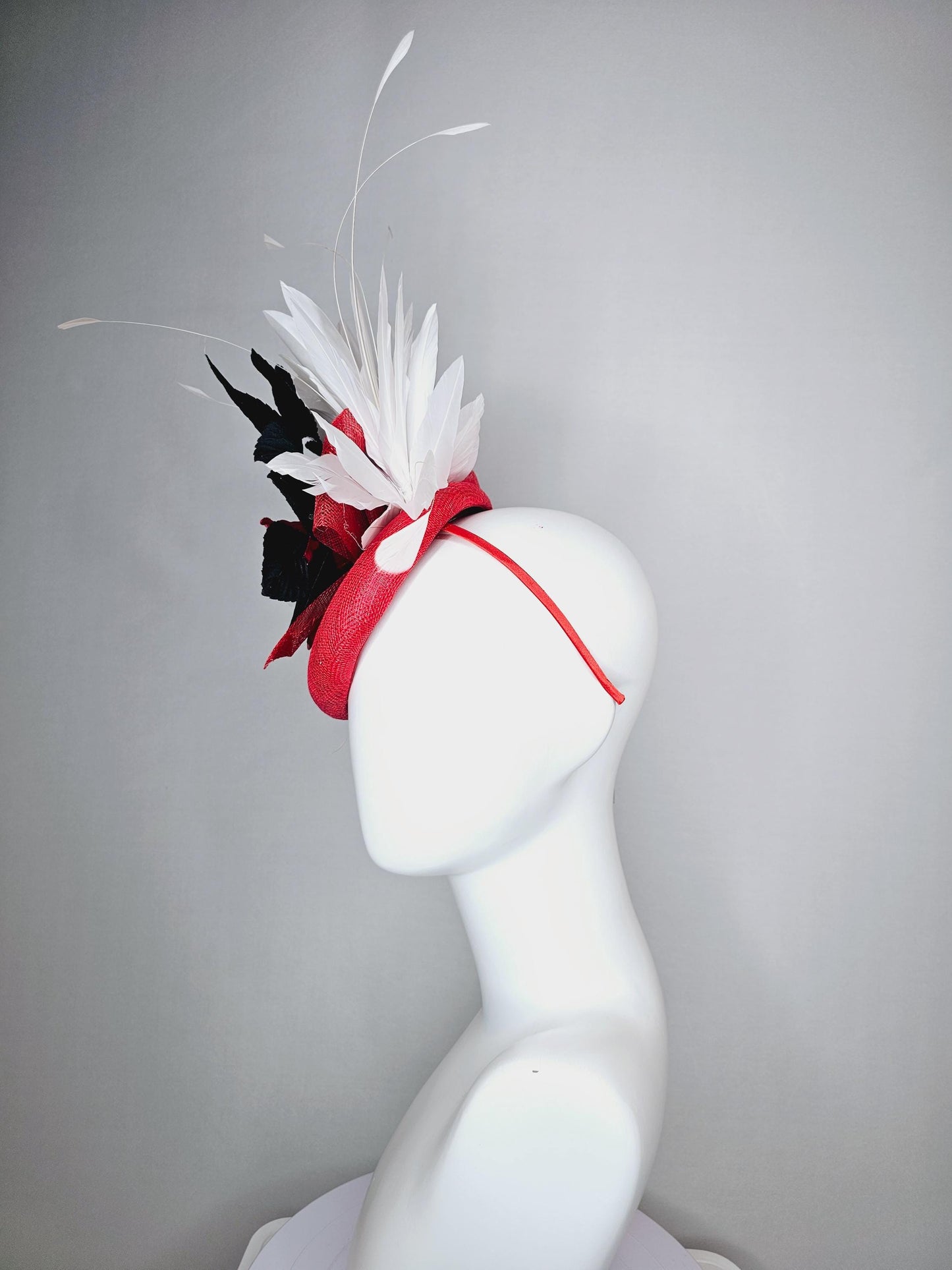 kentucky derby hat fascinator scarlet red sinamay base,silk cherry red rose black velvet feathers and white branching feathers