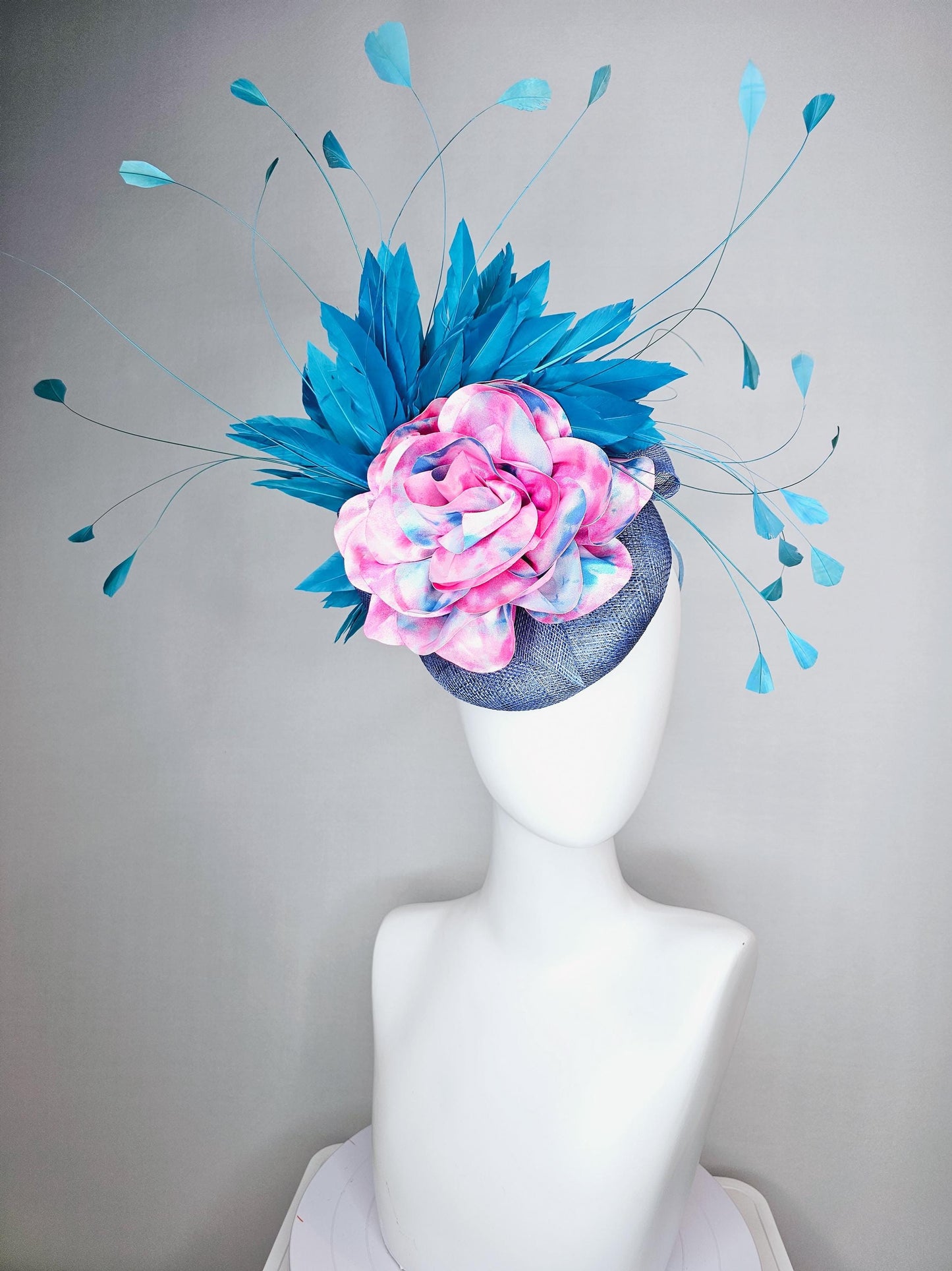 kentucky derby hat fascinator royal blue sinamay base with tie dye pink blue silk large flower and teal blue branching feathers