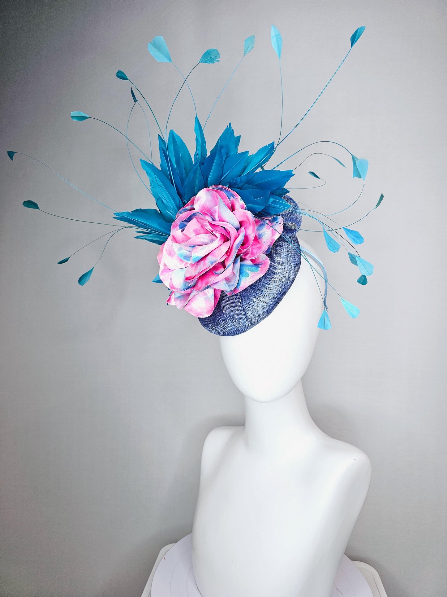 kentucky derby hat fascinator royal blue sinamay base with tie dye pink blue silk large flower and teal blue branching feathers