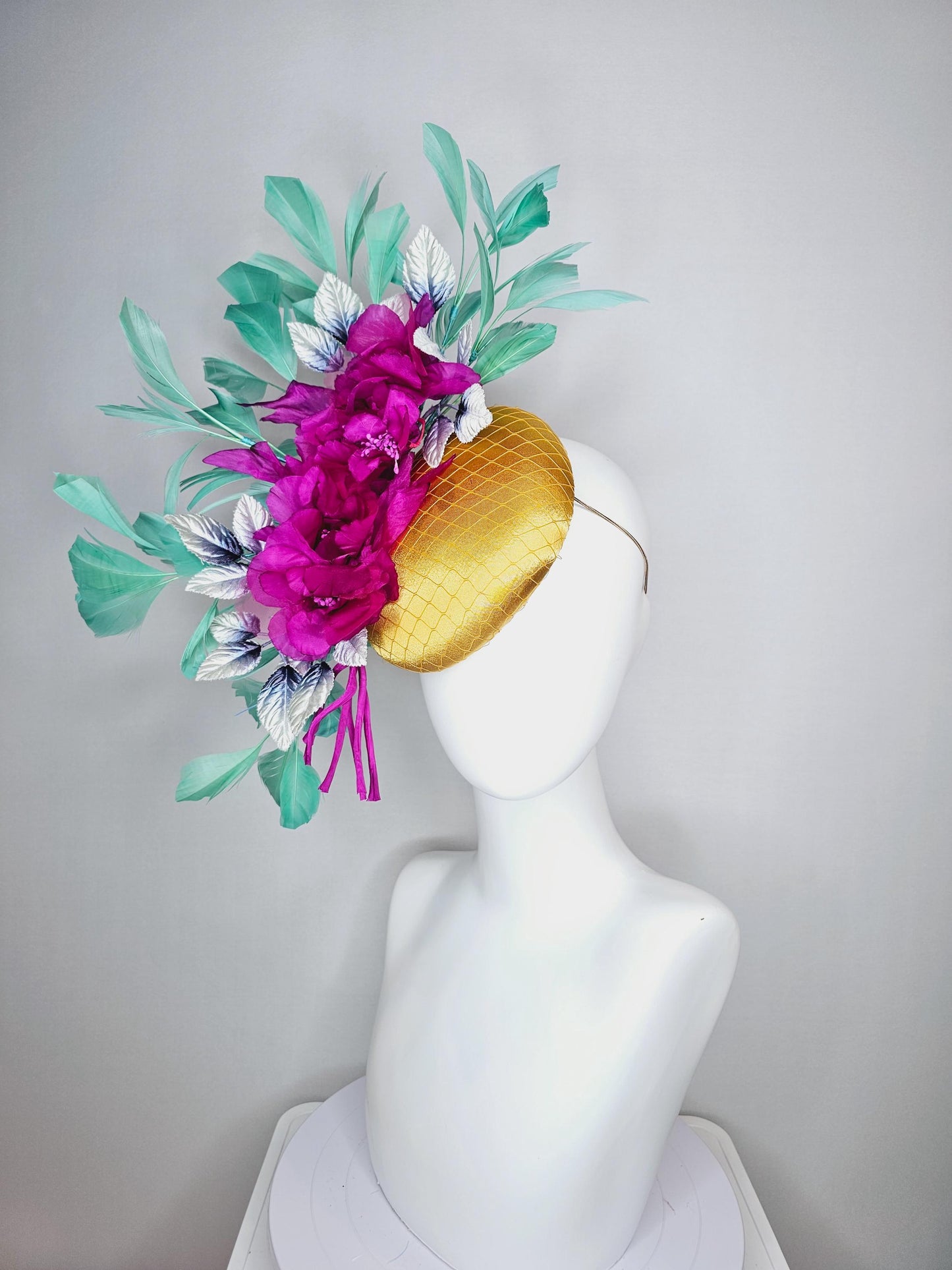 kentucky derby hat fascinator yellow gold satin with netting fuchsia pink organza satin flowers ombre blue leaves mint green feathers