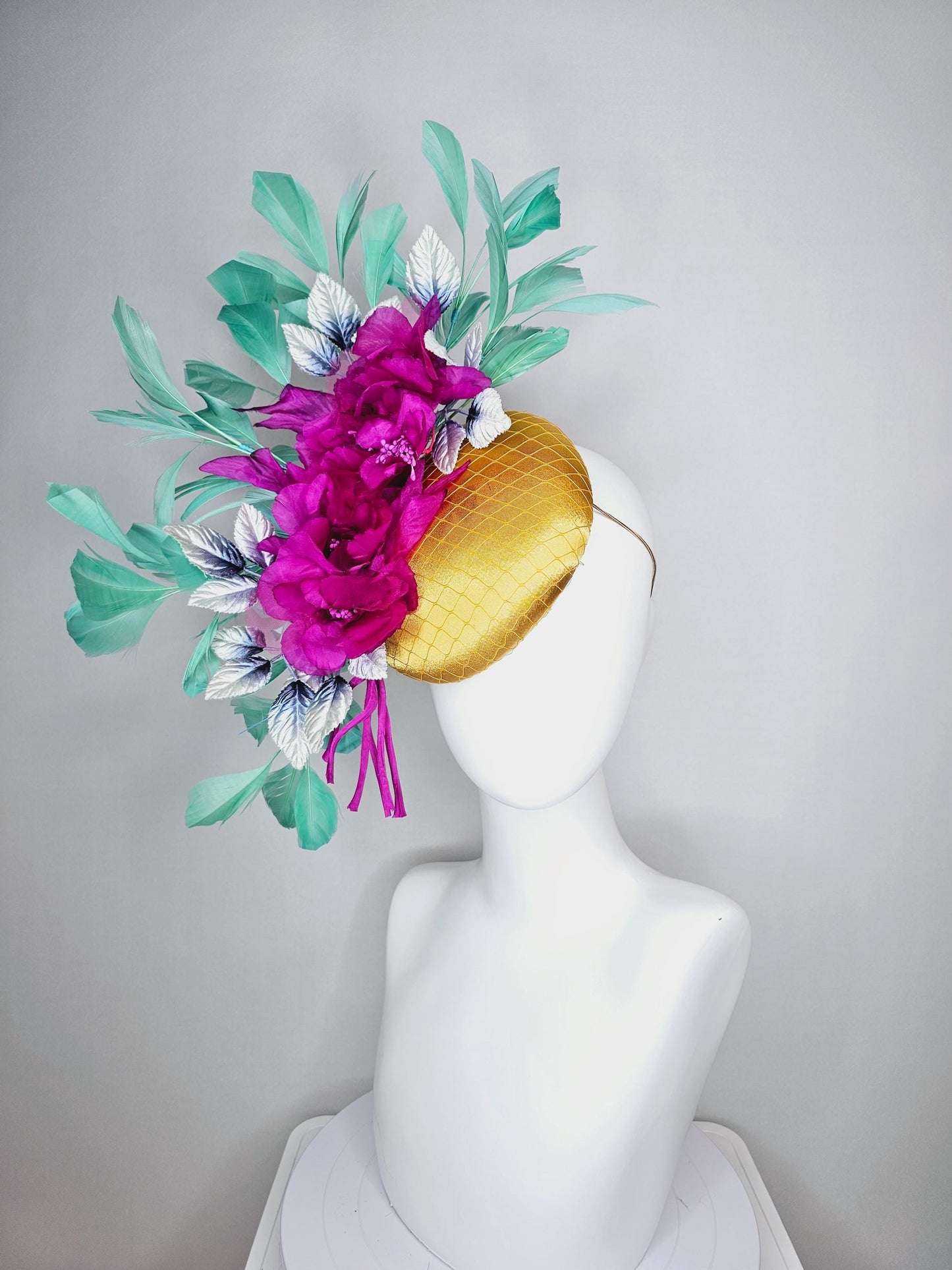 kentucky derby hat fascinator yellow gold satin with netting fuchsia pink organza satin flowers ombre blue leaves mint green feathers
