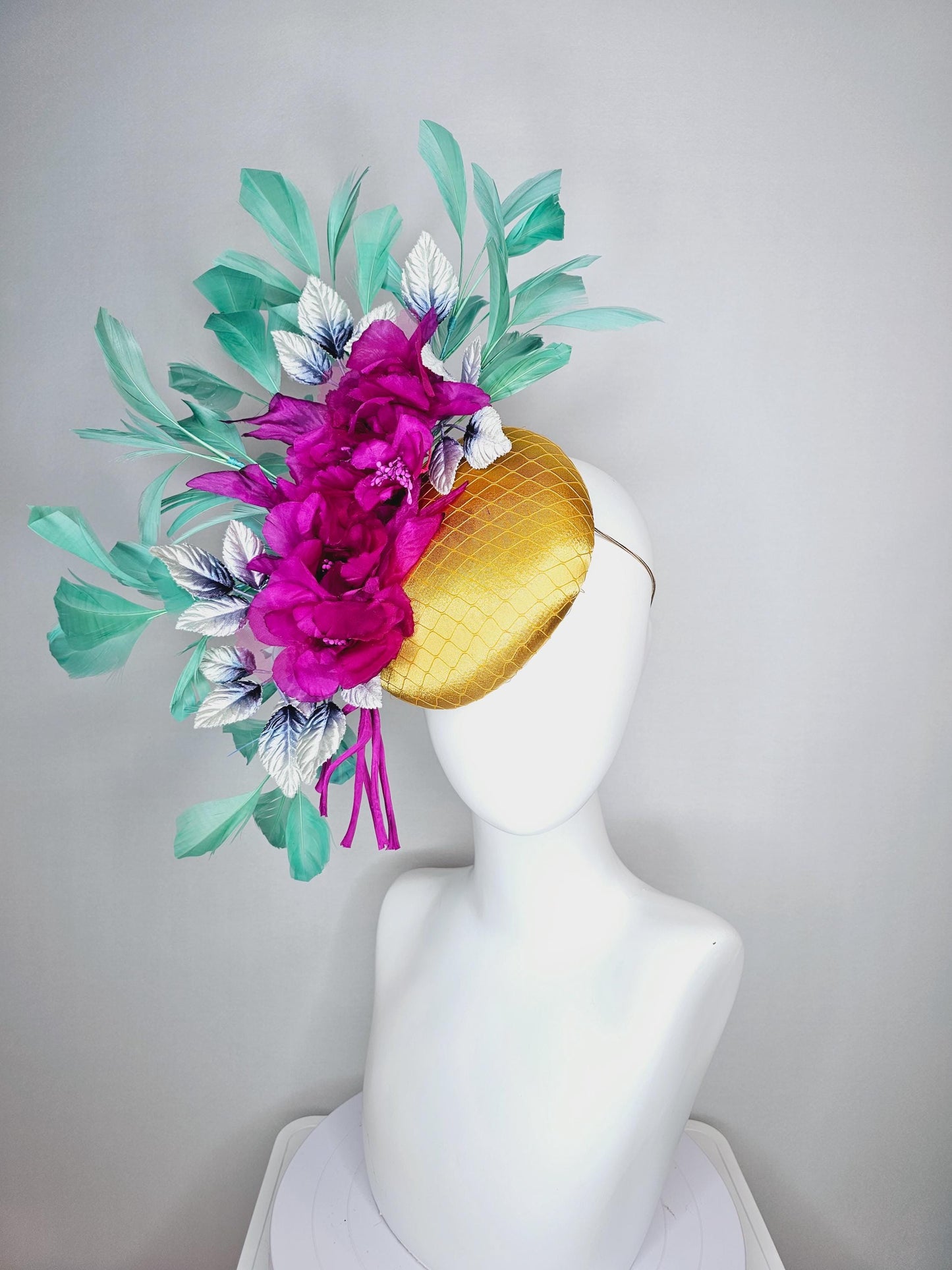 kentucky derby hat fascinator yellow gold satin with netting fuchsia pink organza satin flowers ombre blue leaves mint green feathers