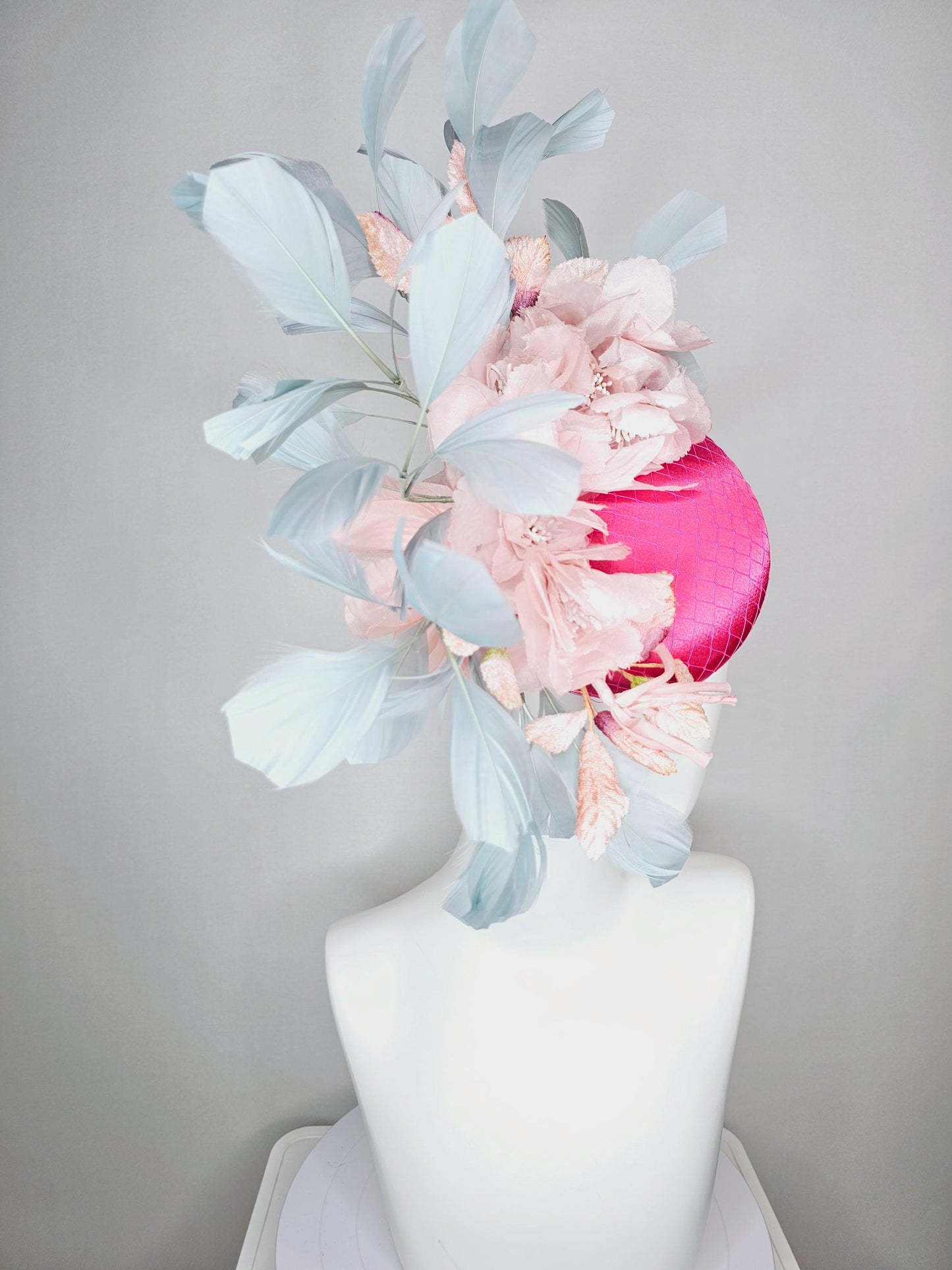 kentucky derby hat fascinator hot pink satin with netting light baby pink organza satin flowers light teal blue branching feathers