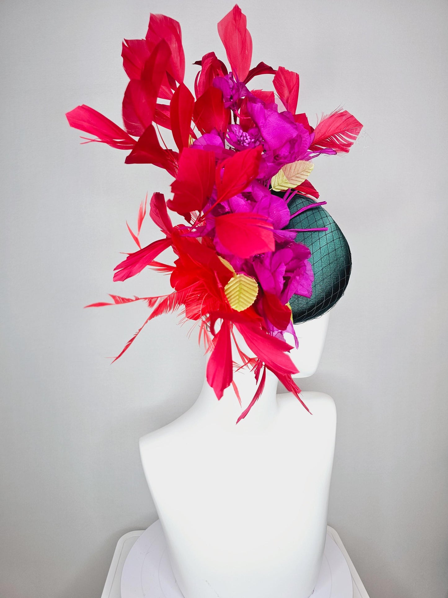 kentucky derby hat fascinator emerald green satin with netting and fuchsia pink satin flowers yellow leaves cherry red branching feathers