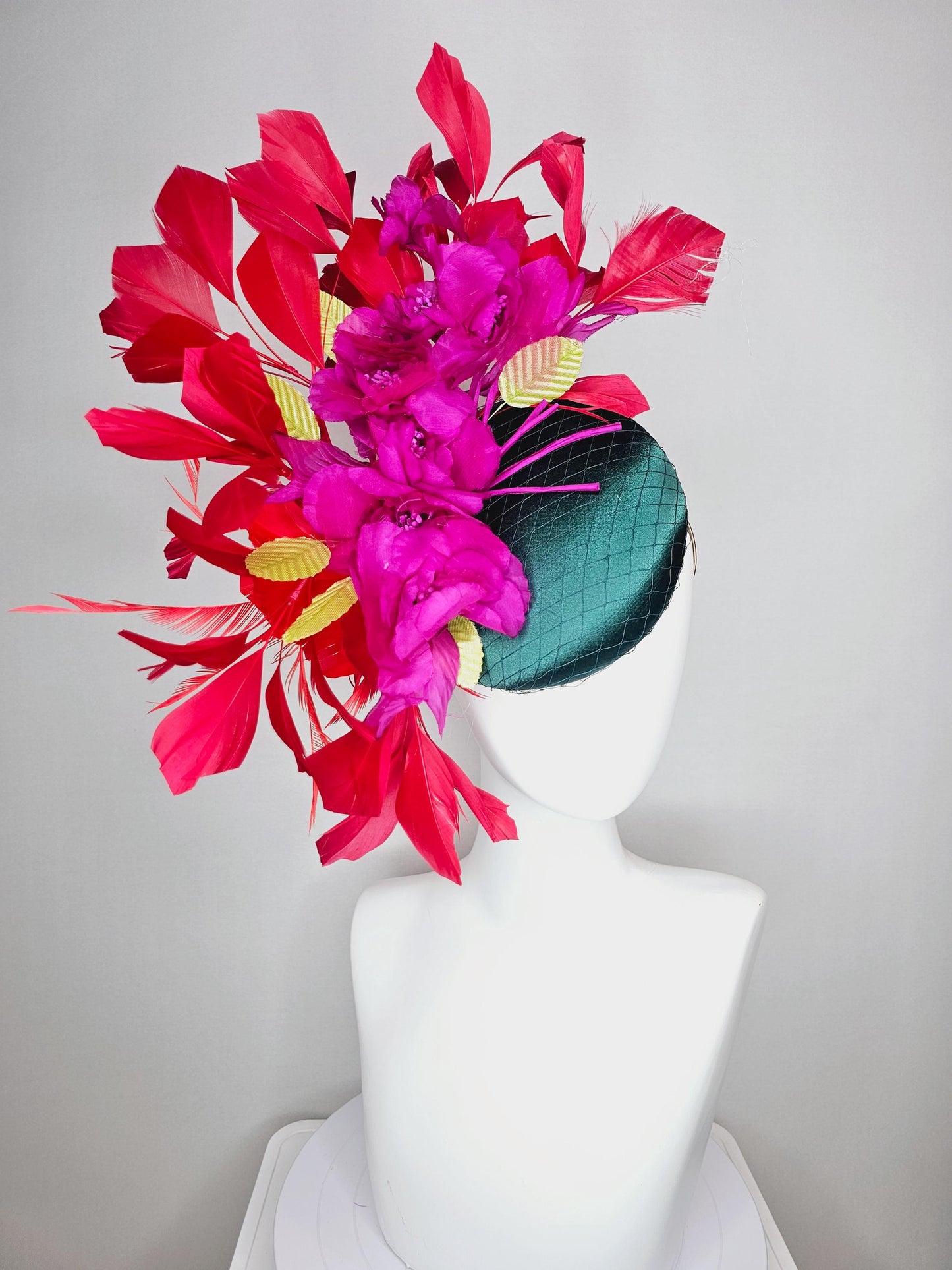 kentucky derby hat fascinator emerald green satin with netting and fuchsia pink satin flowers yellow leaves cherry red branching feathers