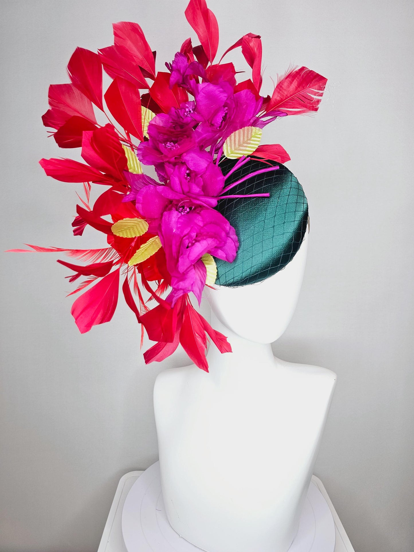 kentucky derby hat fascinator emerald green satin with netting and fuchsia pink satin flowers yellow leaves cherry red branching feathers