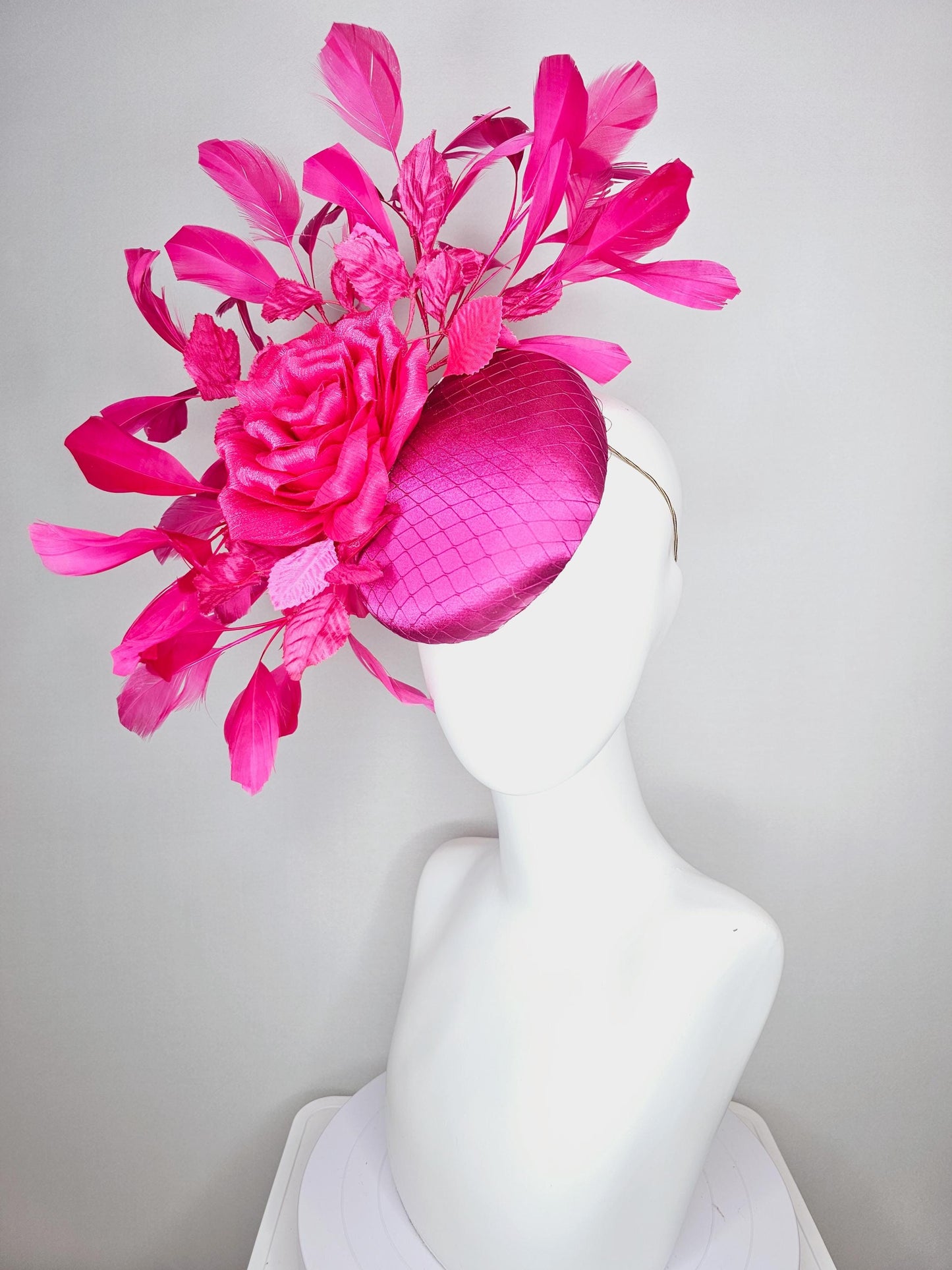 kentucky derby hat fascinator fuchsia pink satin with netting hot bright pink satin rose flower pink leaves bright pink branching feathers