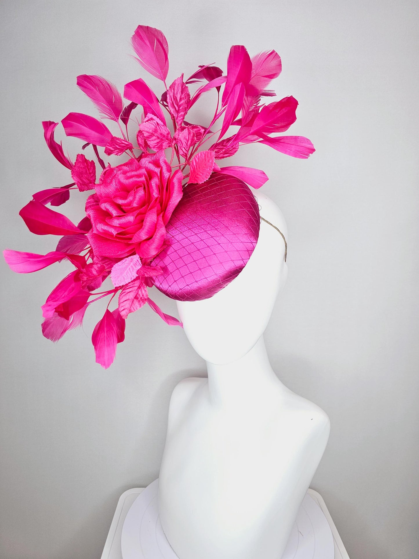 kentucky derby hat fascinator fuchsia pink satin with netting hot bright pink satin rose flower pink leaves bright pink branching feathers