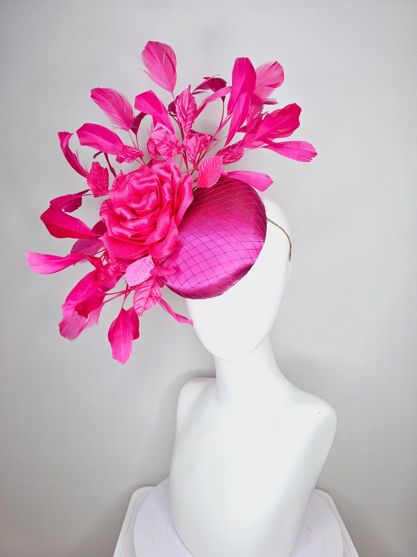 kentucky derby hat fascinator fuchsia pink satin with netting hot bright pink satin rose flower pink leaves bright pink branching feathers