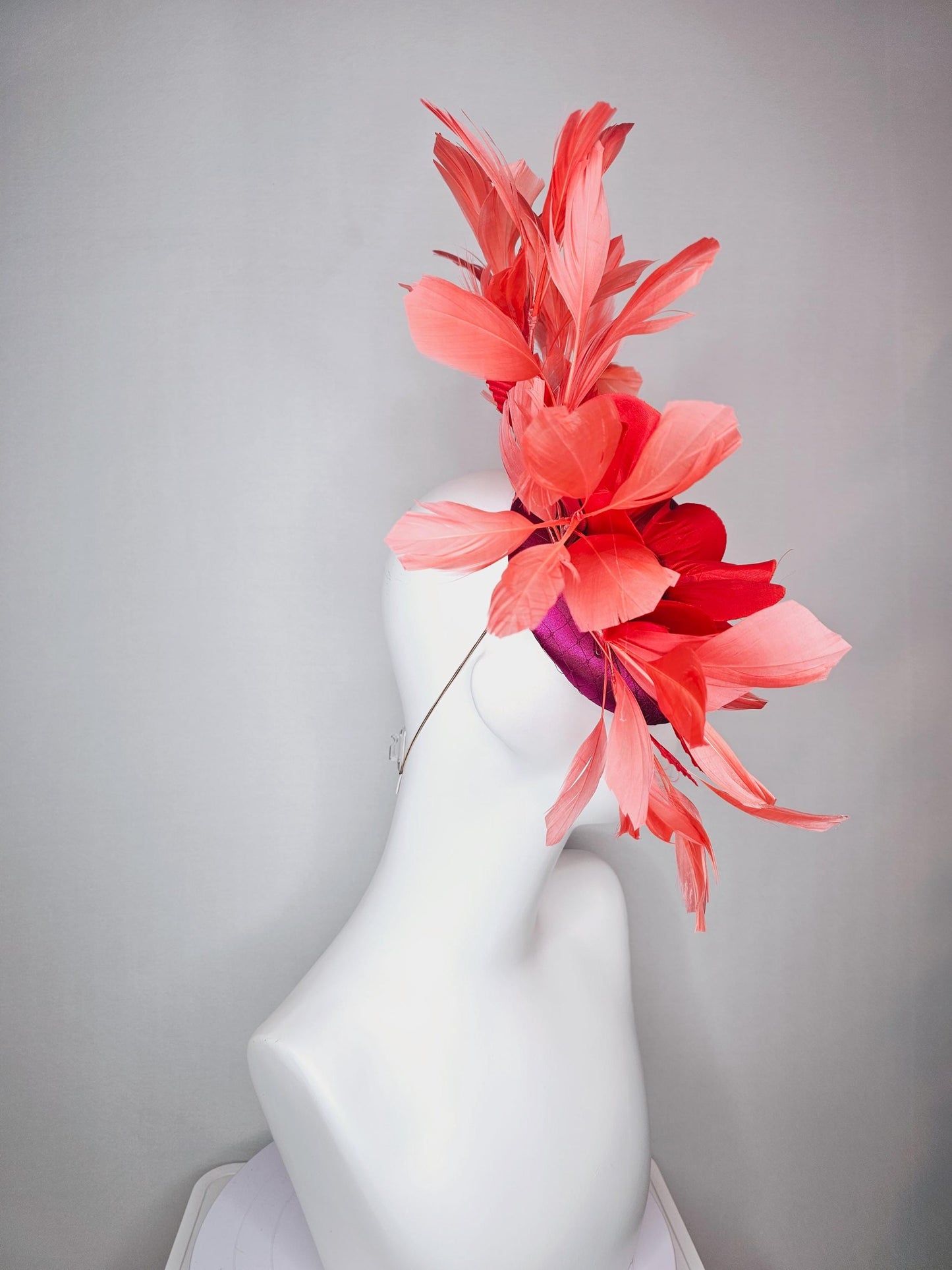 kentucky derby fascinator fuchsia pink satin with netting with large cherry red silk flower beaded core red velvet leaves coral feathers