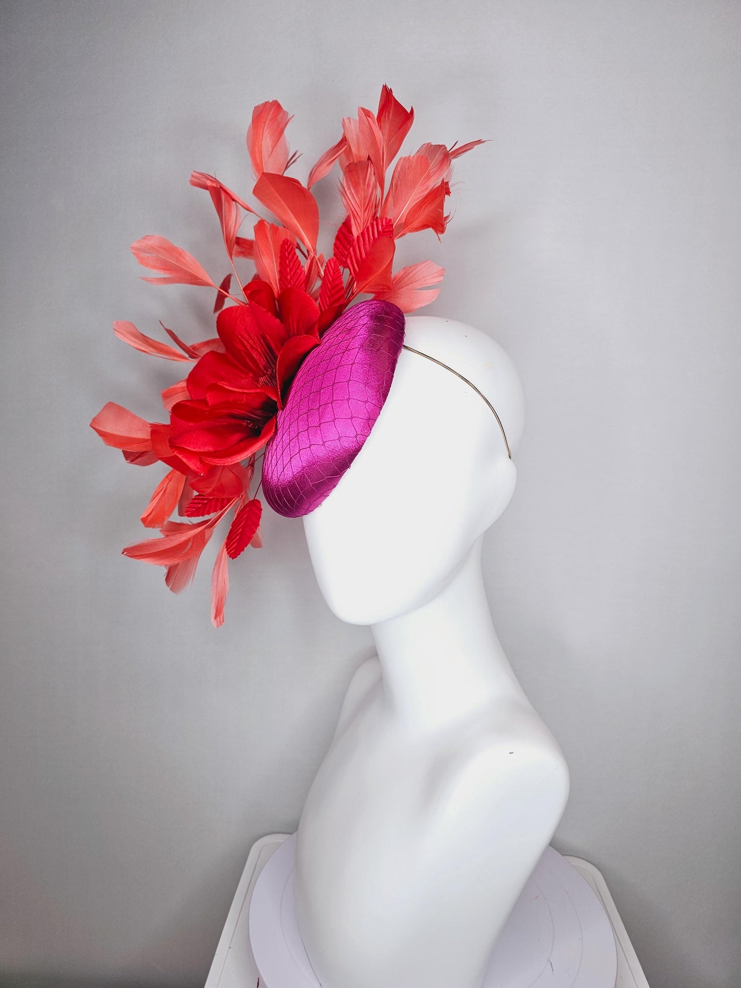 kentucky derby fascinator fuchsia pink satin with netting with large cherry red silk flower beaded core red velvet leaves coral feathers