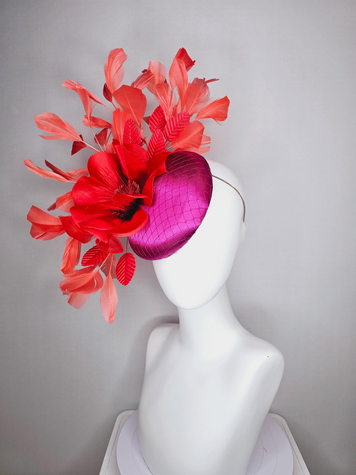 kentucky derby fascinator fuchsia pink satin with netting with large cherry red silk flower beaded core red velvet leaves coral feathers