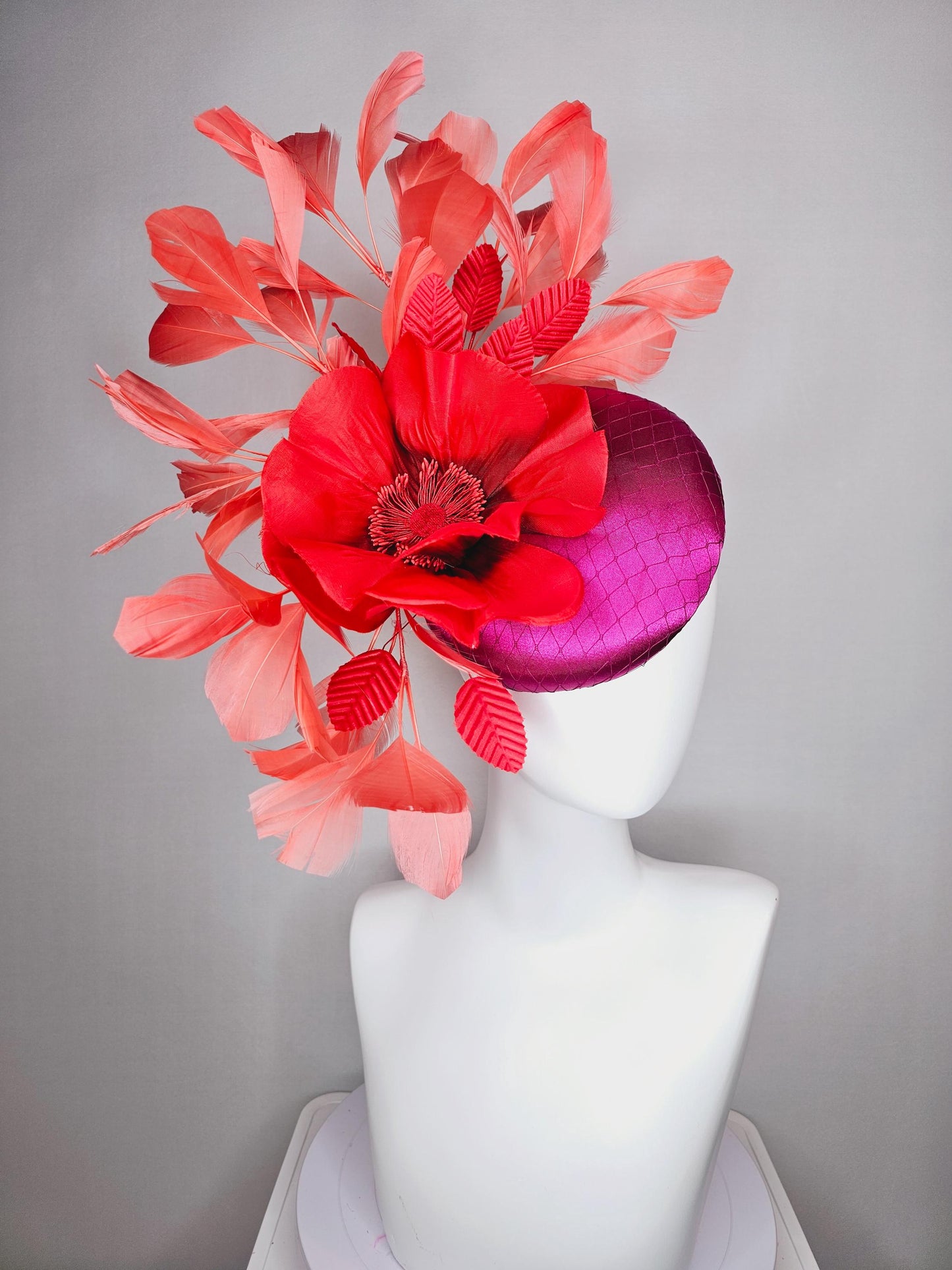 kentucky derby fascinator fuchsia pink satin with netting with large cherry red silk flower beaded core red velvet leaves coral feathers