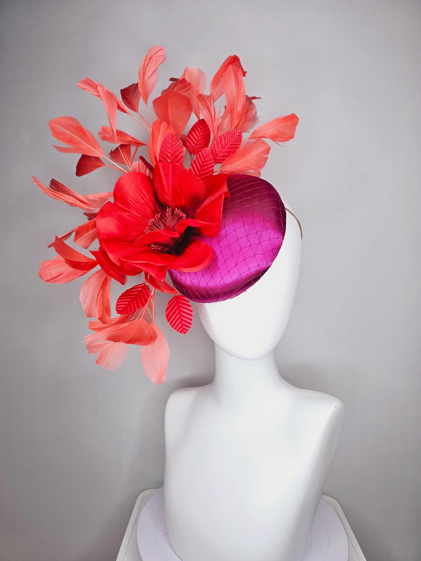 kentucky derby fascinator fuchsia pink satin with netting with large cherry red silk flower beaded core red velvet leaves coral feathers