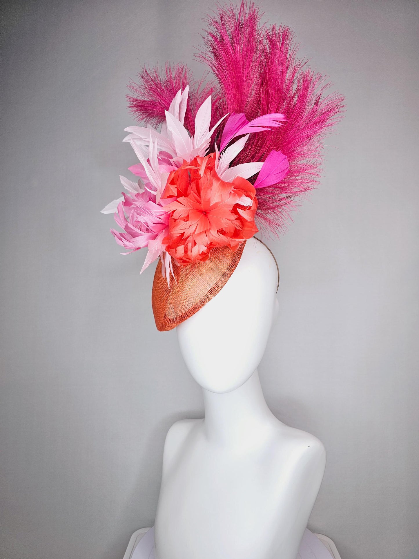 kentucky derby hat fascinator pointed burnt orange sinamay with light pink red orange feather flowers pink feathers hot pink pampas grass