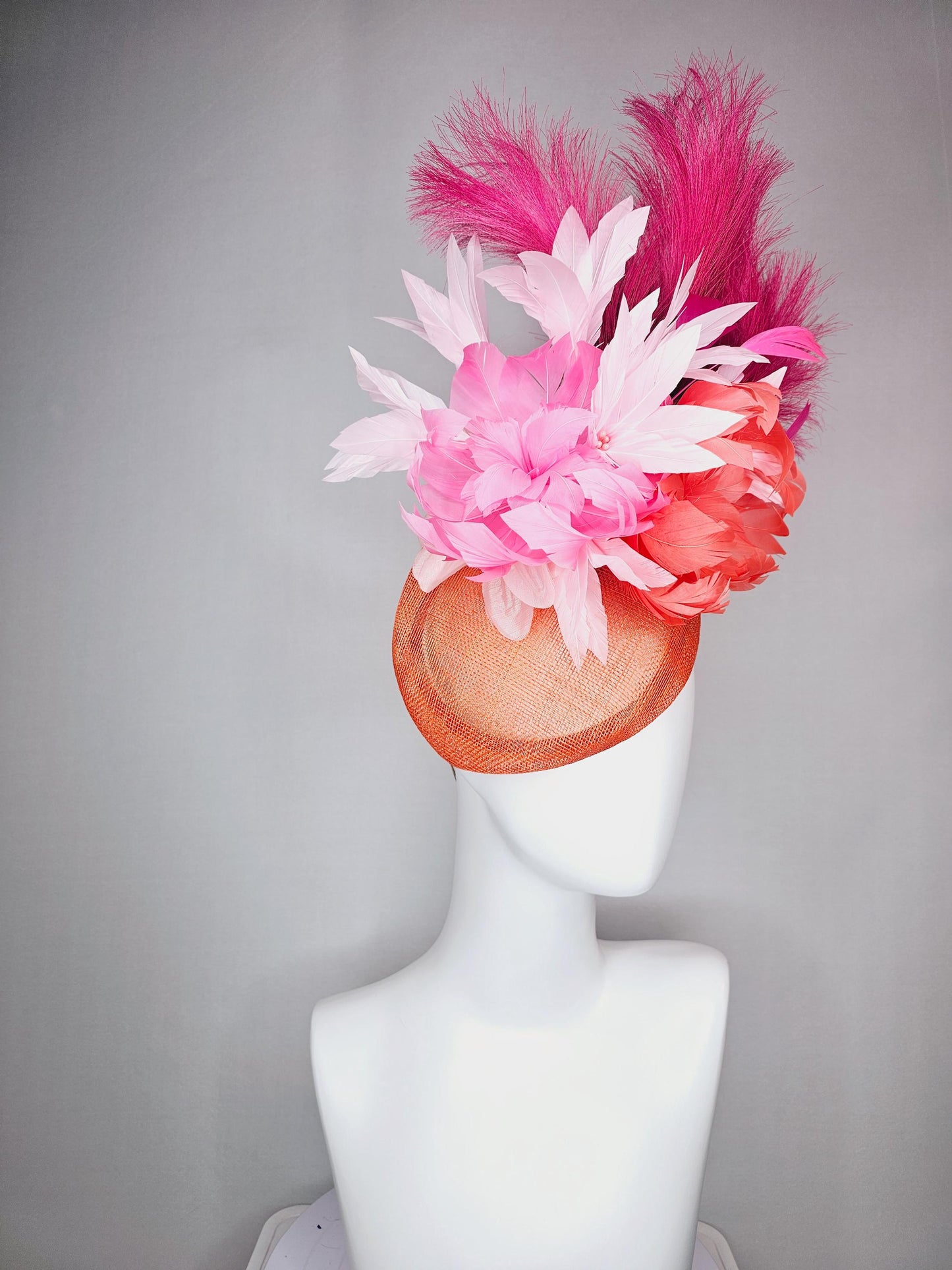 kentucky derby hat fascinator pointed burnt orange sinamay with light pink red orange feather flowers pink feathers hot pink pampas grass