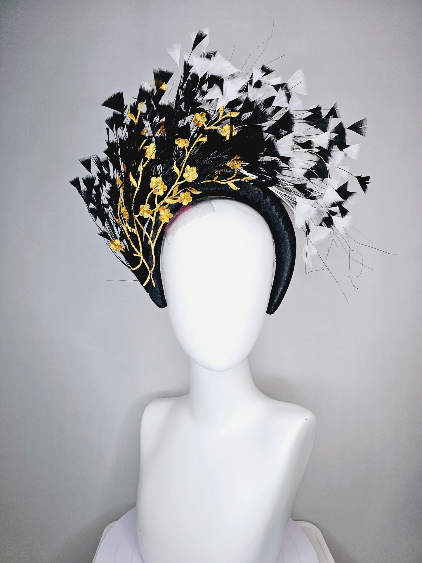 kentucky derby hat fascinator black satin headband with black and white branching feathers yellow gold embroidered flowers
