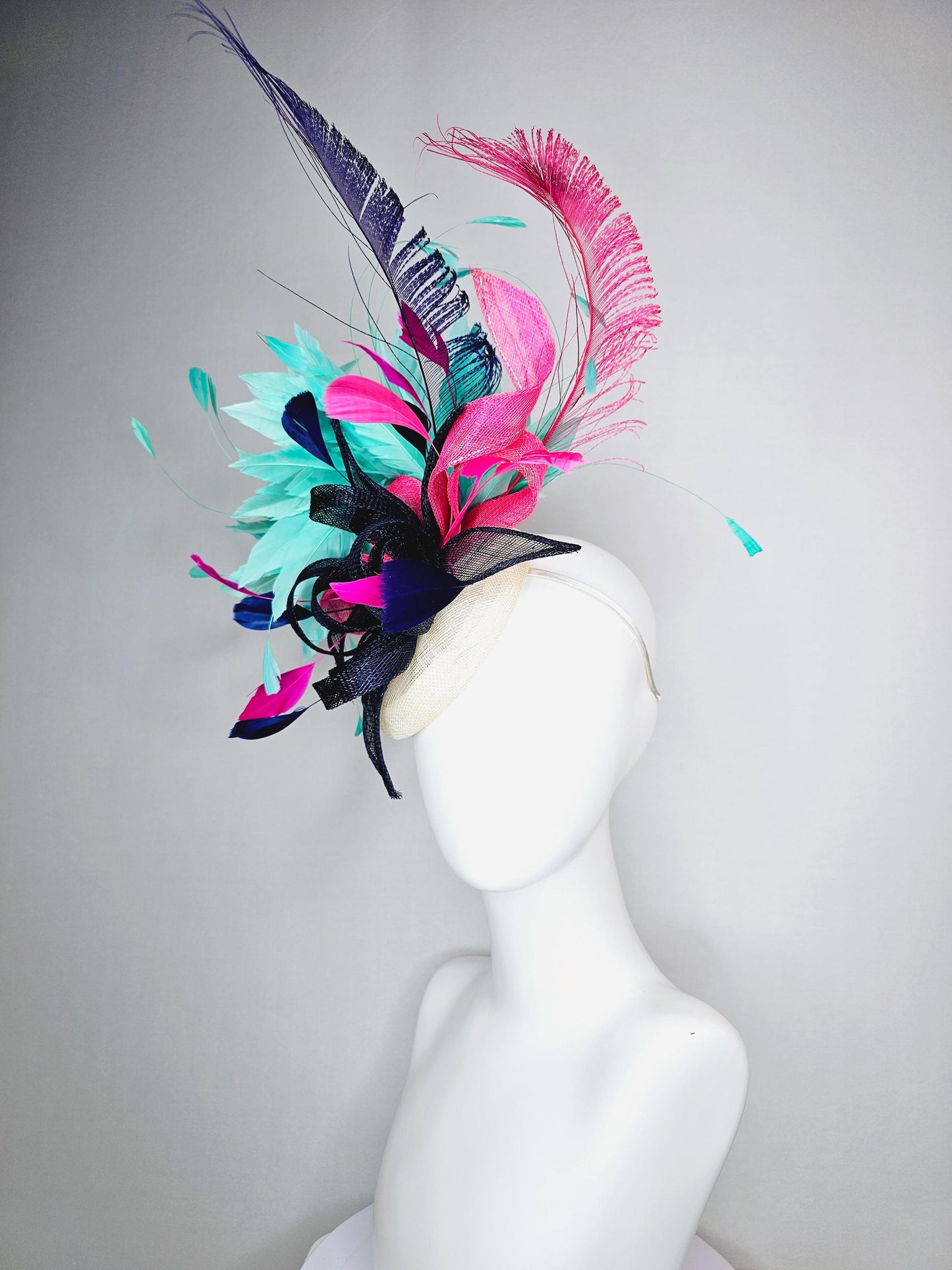 kentucky derby hat fascinator ivory white sinamay with navy blue raspberry pink sinamay flower and aqua green branching feathers