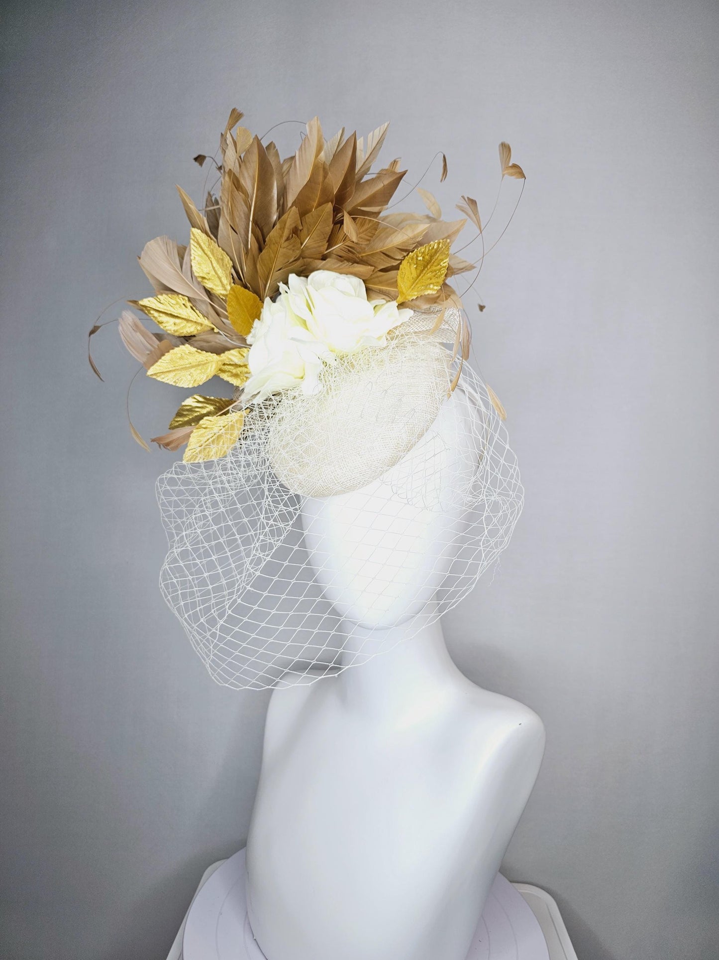 kentucky derby hat fascinator white sinamay with white netting off white silk roses gold lame metallic eaves gold beige branching feathers