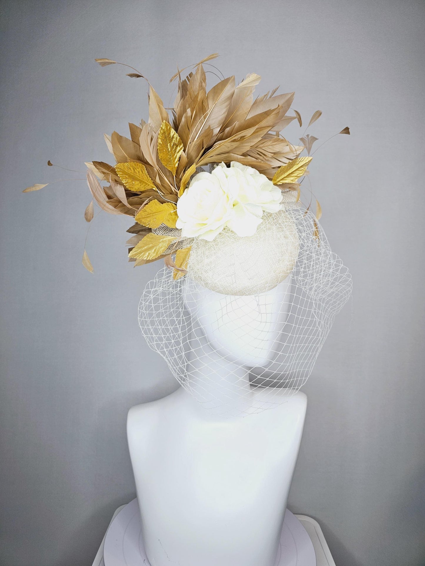 kentucky derby hat fascinator white sinamay with white netting off white silk roses gold lame metallic eaves gold beige branching feathers