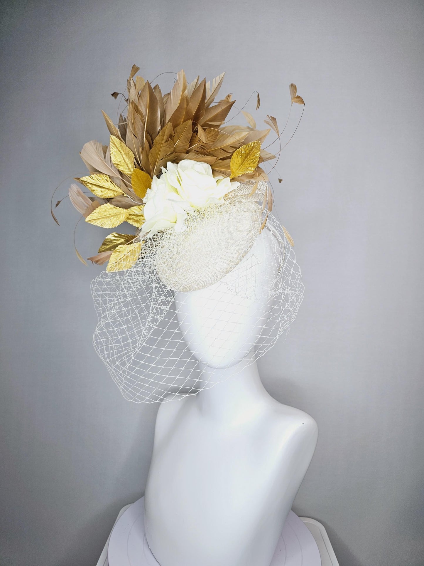 kentucky derby hat fascinator white sinamay with white netting off white silk roses gold lame metallic eaves gold beige branching feathers