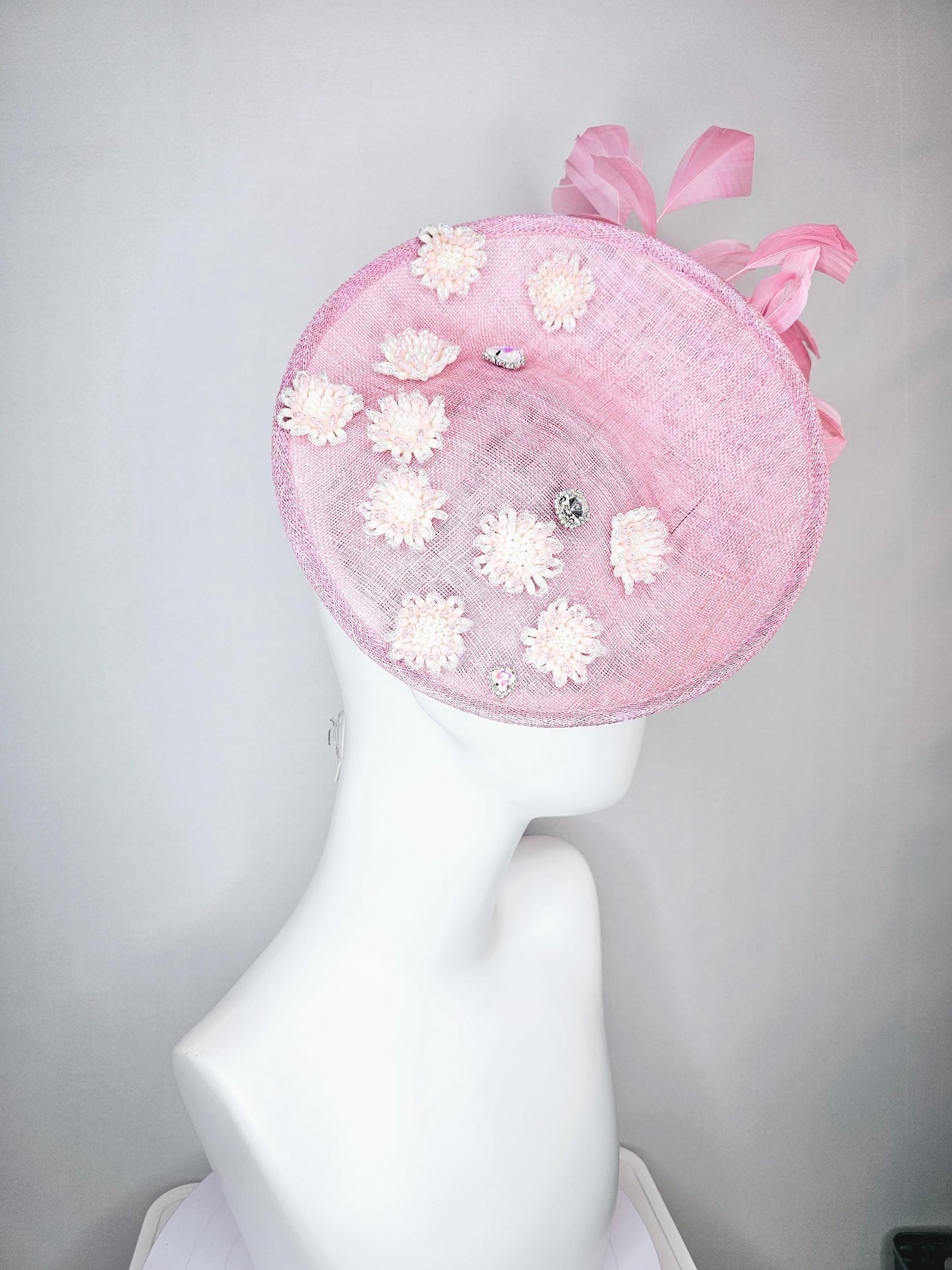 kentucky derby hat fascinator baby pink sinamay saucer with crystal jewel and light pink pearl beaded flowers pink branching feathers
