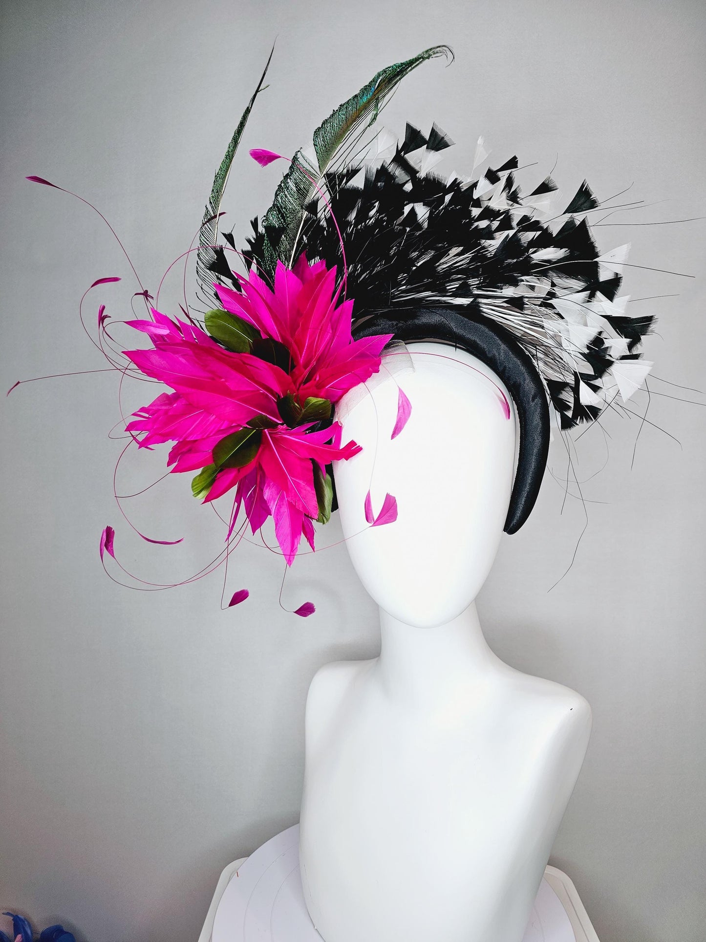 kentucky derby hat fascinator black satin headband with fuchsia pink feather flower green feathers and black and white branching feathers