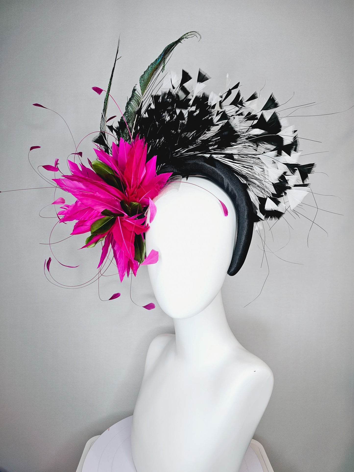kentucky derby hat fascinator black satin headband with fuchsia pink feather flower green feathers and black and white branching feathers