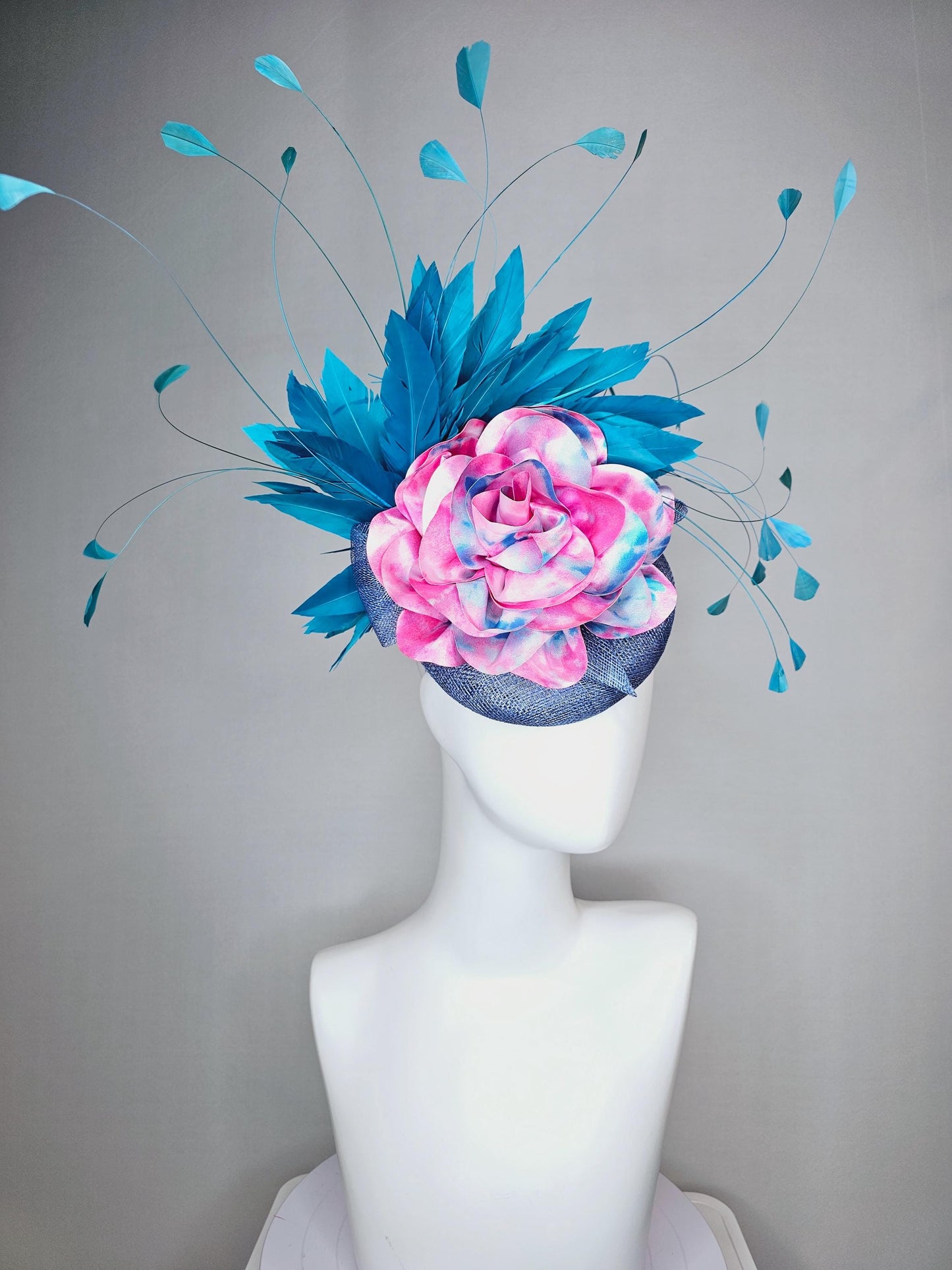 kentucky derby hat fascinator royal blue sinamay base with tie dye pink blue silk large flower and teal blue branching feathers