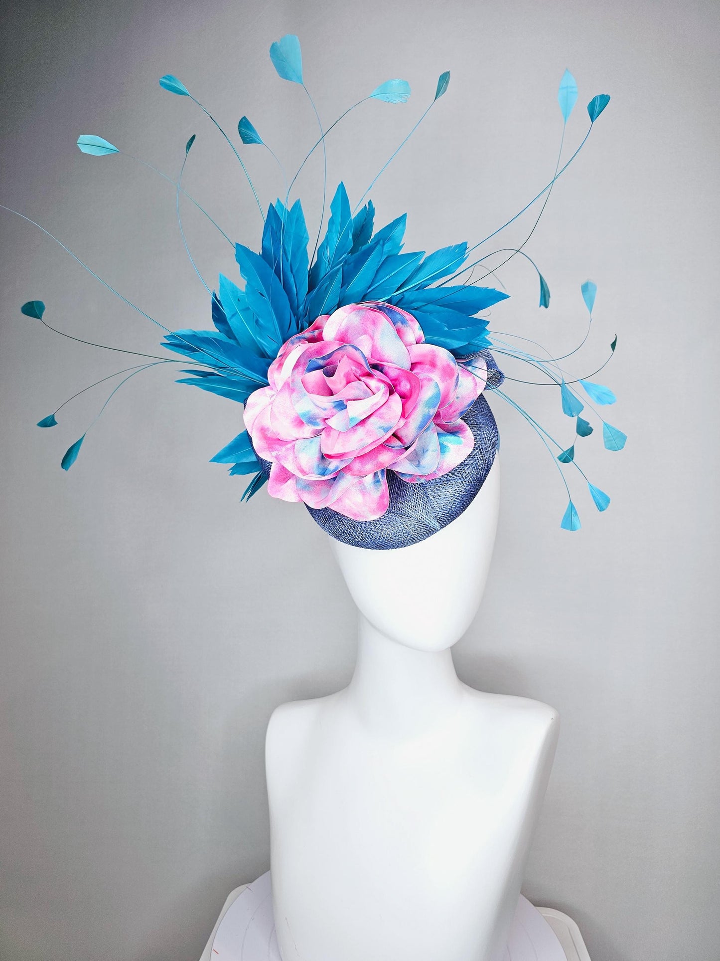 kentucky derby hat fascinator royal blue sinamay base with tie dye pink blue silk large flower and teal blue branching feathers