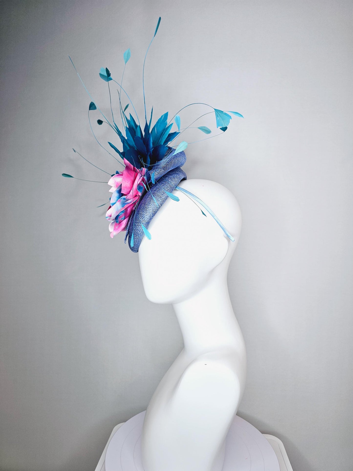kentucky derby hat fascinator royal blue sinamay base with tie dye pink blue silk large flower and teal blue branching feathers