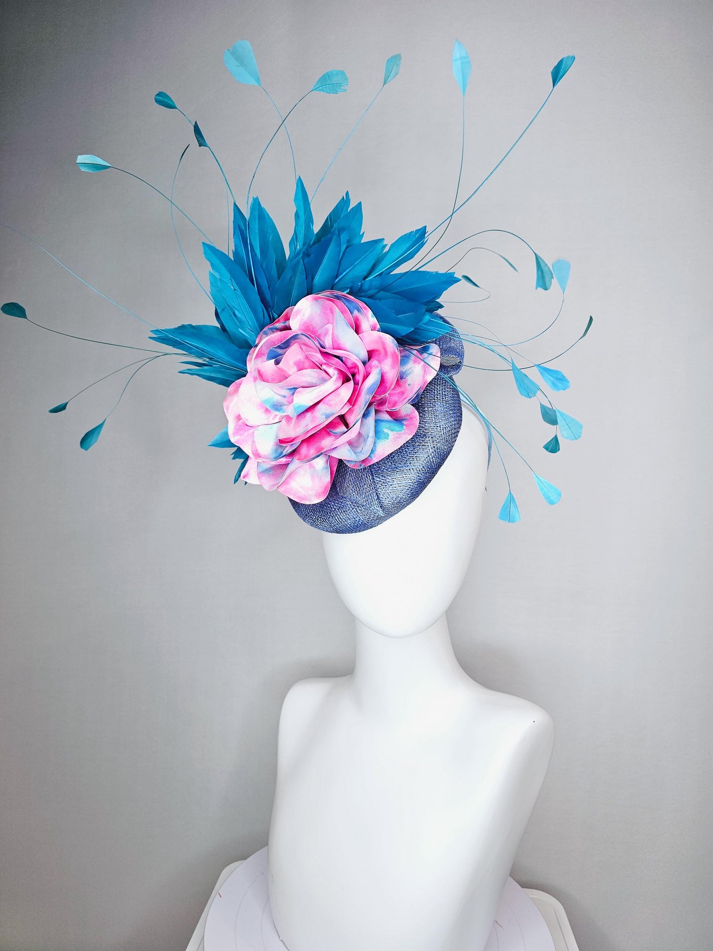 kentucky derby hat fascinator royal blue sinamay base with tie dye pink blue silk large flower and teal blue branching feathers