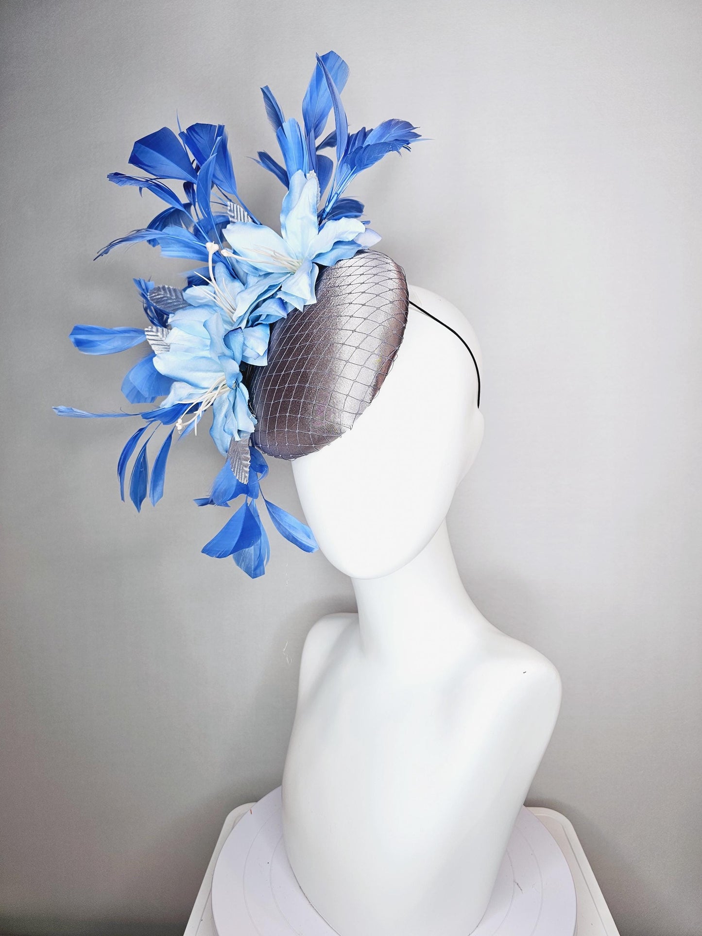 kentucky derby hat fascinator silver gray satin with netting light baby blue satin flowers silver leaves and royal blue branching feathers