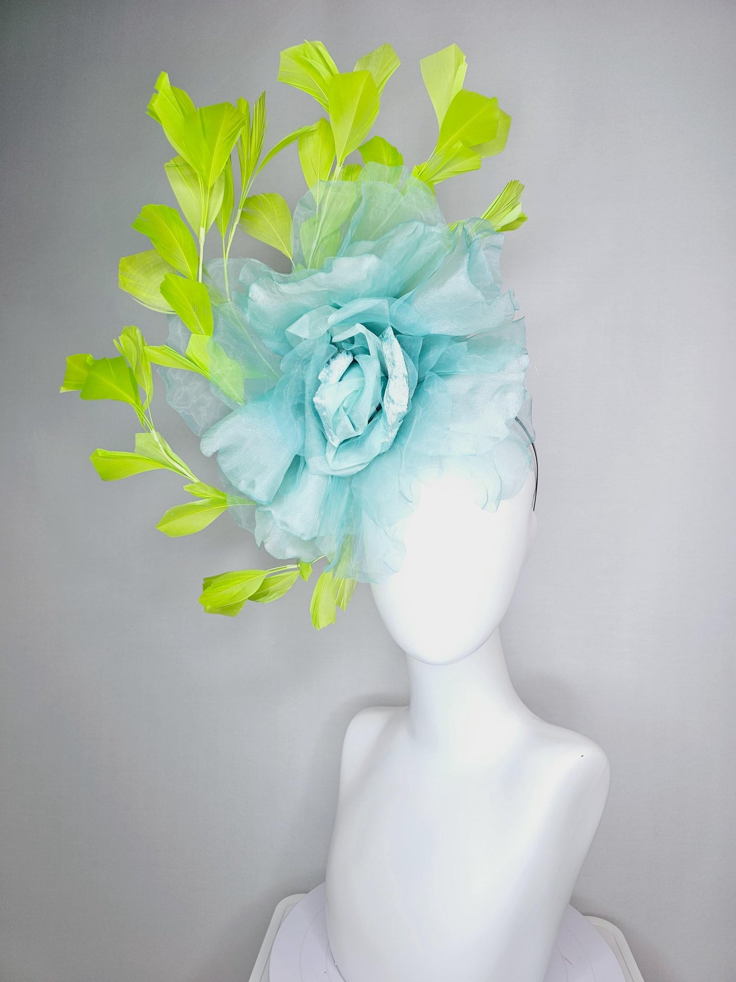kentucky derby fascinator black headband with very large baby blue organza silk flower and lime green branching feathers