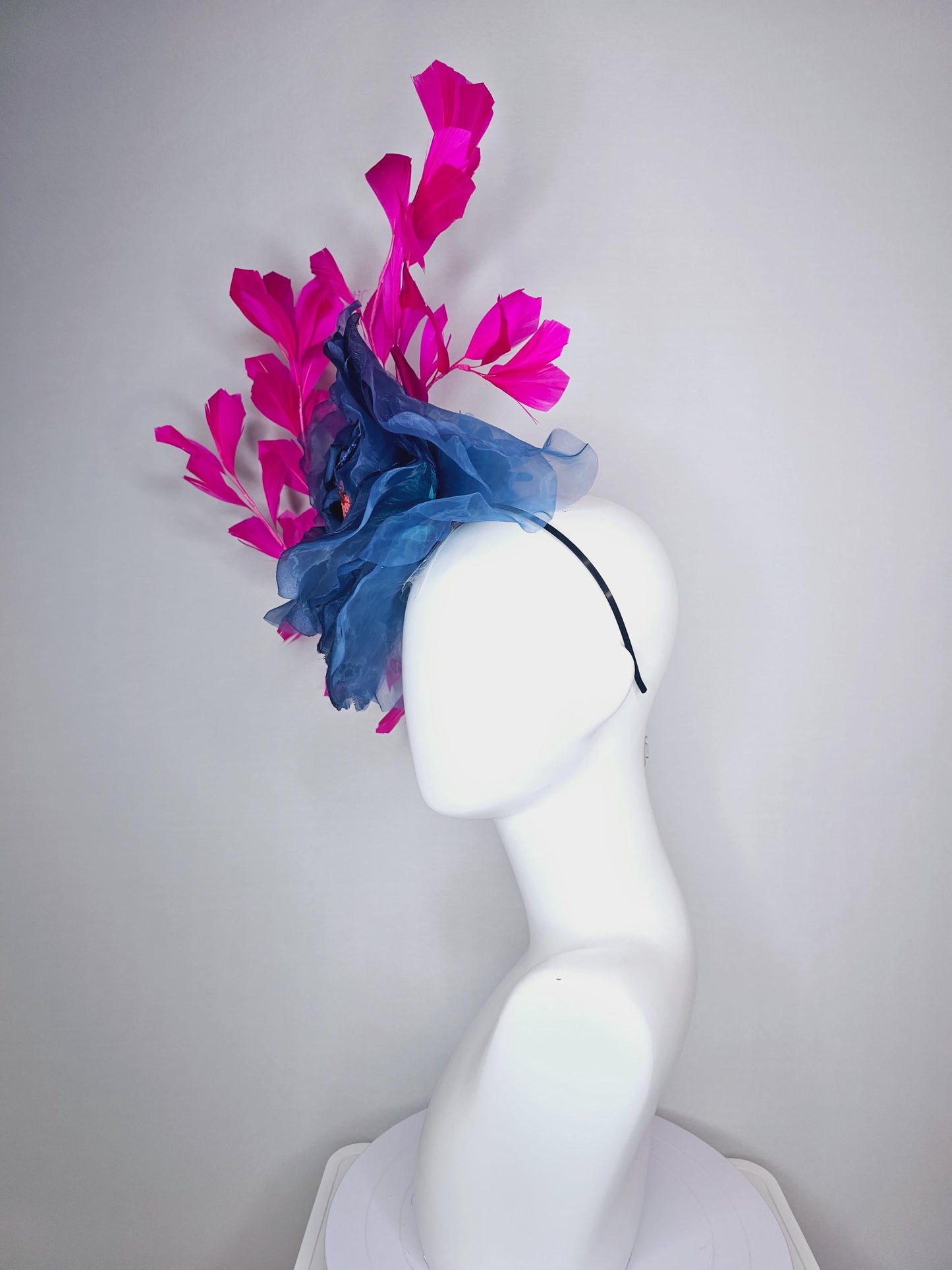 kentucky derby fascinator black headband with very large cobalt denim blue organza silk flower and bright fuchsia pink branching feathers