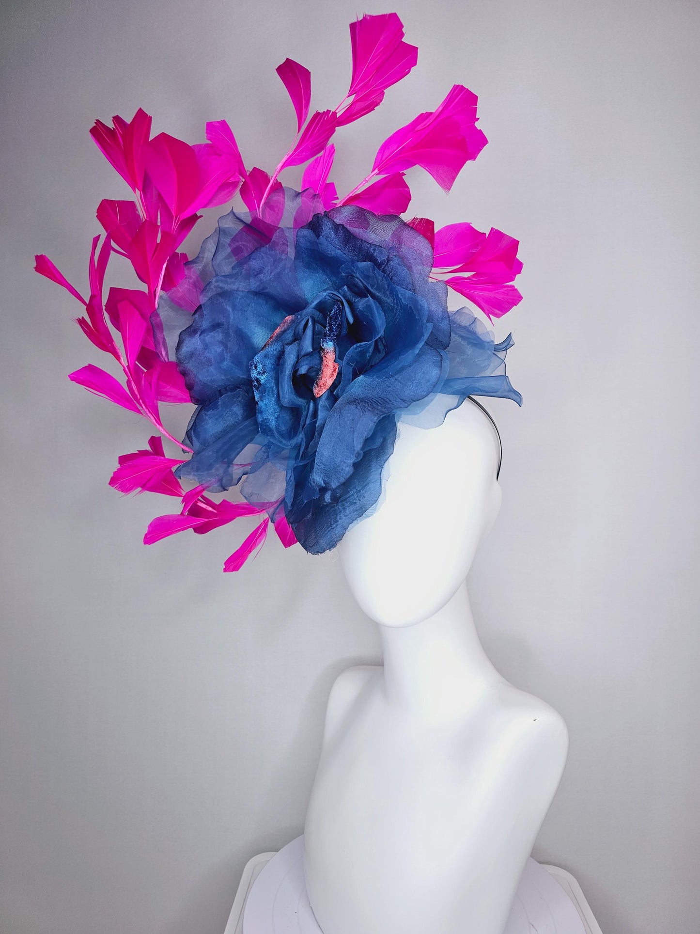 kentucky derby fascinator black headband with very large cobalt denim blue organza silk flower and bright fuchsia pink branching feathers