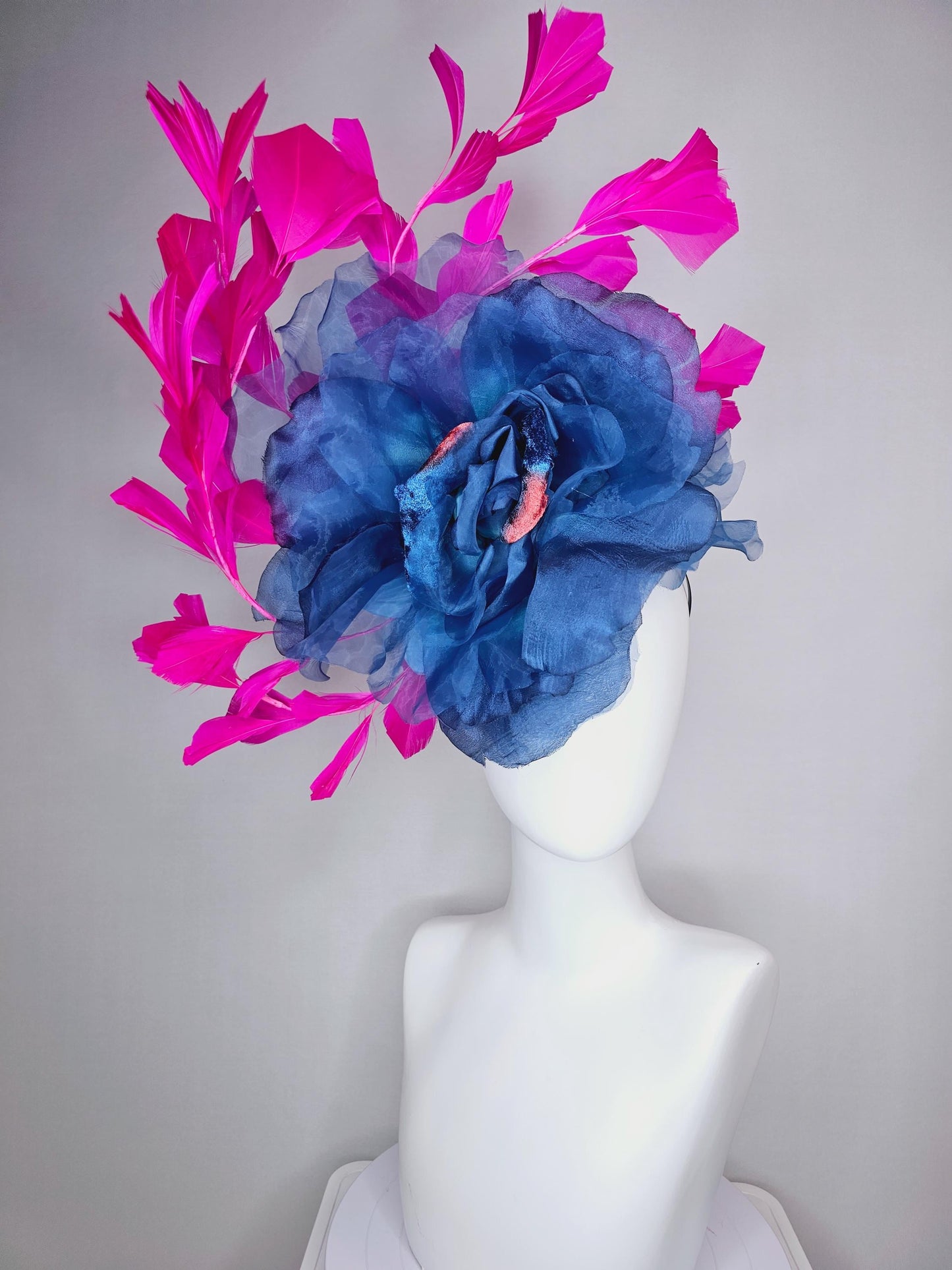 kentucky derby fascinator black headband with very large cobalt denim blue organza silk flower and bright fuchsia pink branching feathers