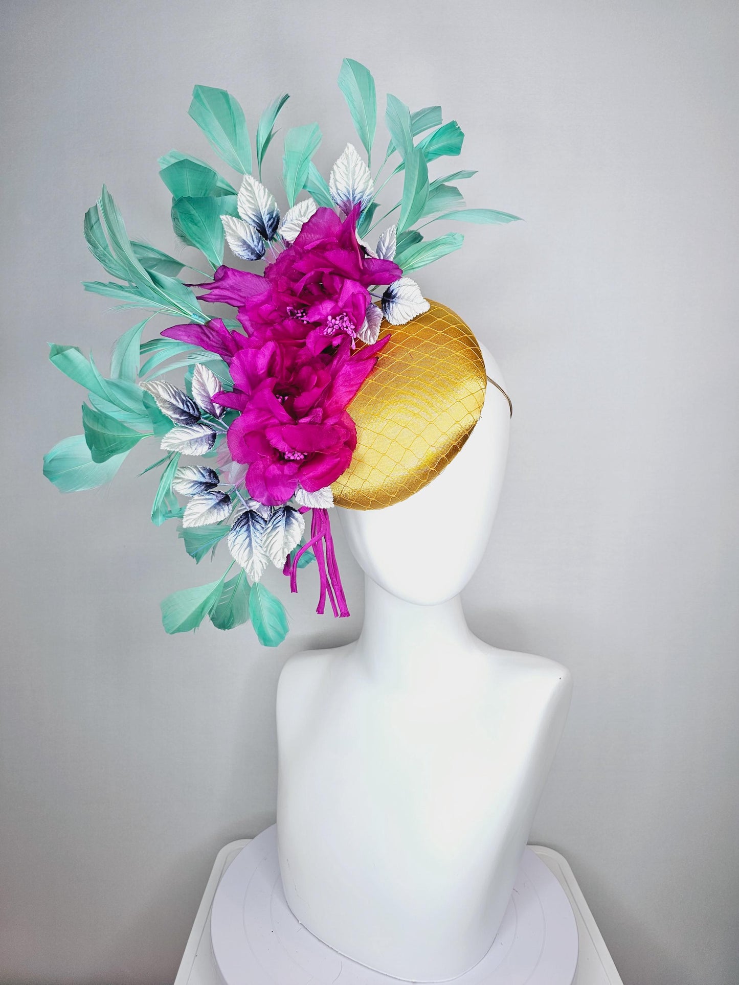 kentucky derby hat fascinator yellow gold satin with netting fuchsia pink organza satin flowers ombre blue leaves mint green feathers