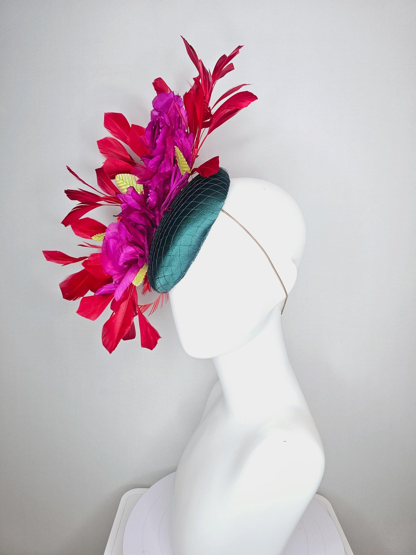 kentucky derby hat fascinator emerald green satin with netting and fuchsia pink satin flowers yellow leaves cherry red branching feathers
