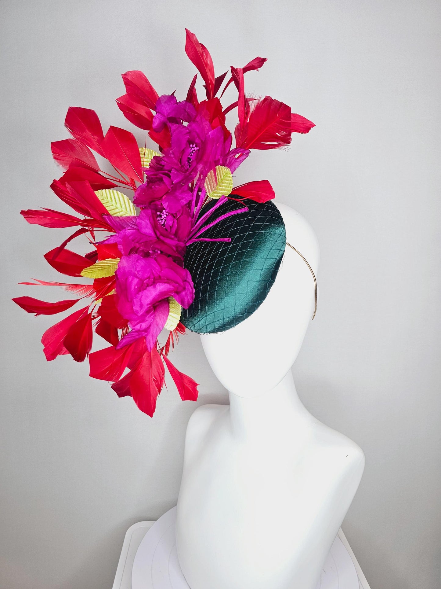 kentucky derby hat fascinator emerald green satin with netting and fuchsia pink satin flowers yellow leaves cherry red branching feathers