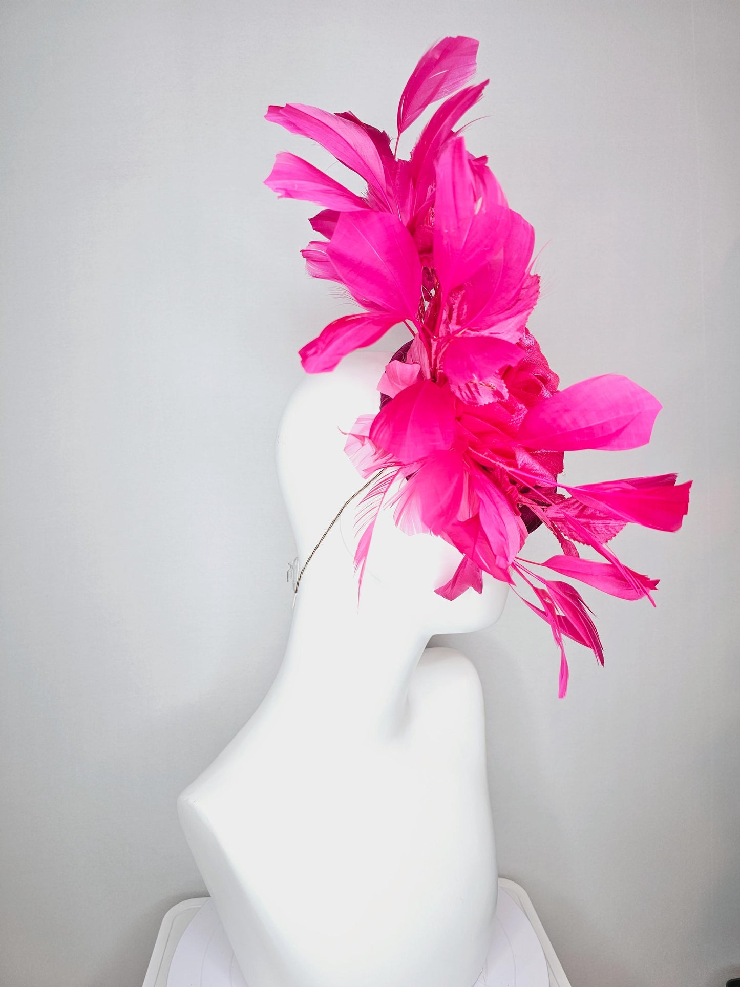 kentucky derby hat fascinator fuchsia pink satin with netting hot bright pink satin rose flower pink leaves bright pink branching feathers