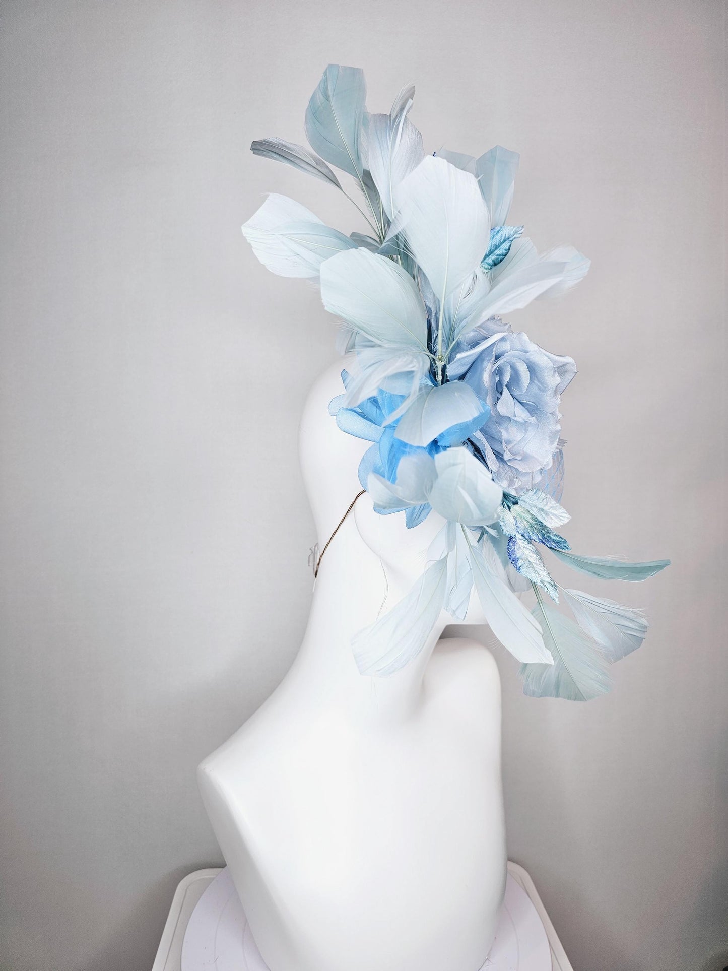 kentucky derby hat fascinator baby blue satin with netting light blue satin rose flowers blue ombre velvet leaves light teal blue feathers