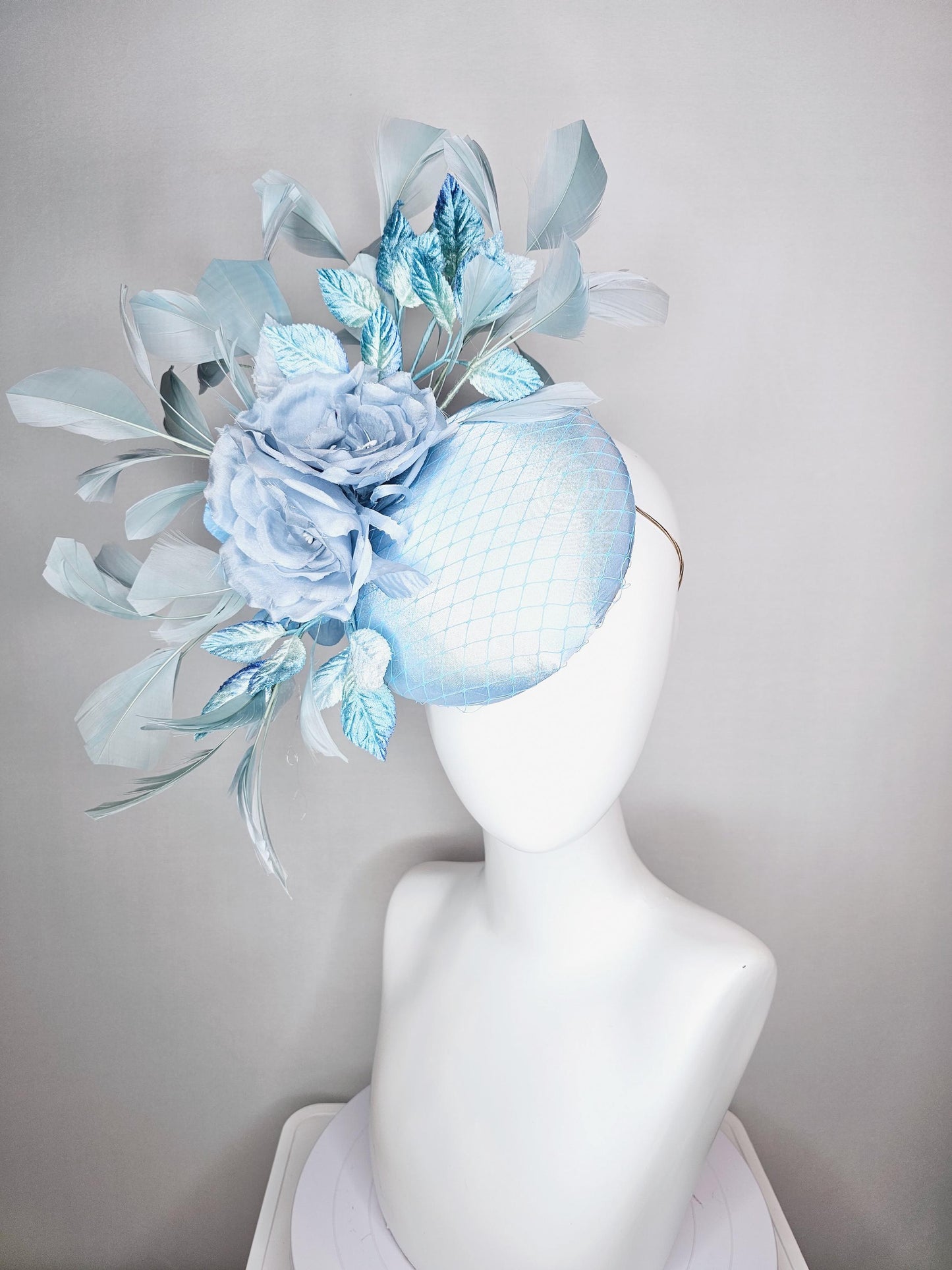 kentucky derby hat fascinator baby blue satin with netting light blue satin rose flowers blue ombre velvet leaves light teal blue feathers