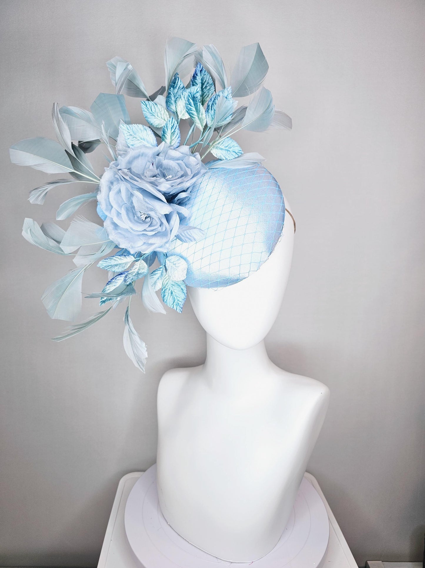 kentucky derby hat fascinator baby blue satin with netting light blue satin rose flowers blue ombre velvet leaves light teal blue feathers