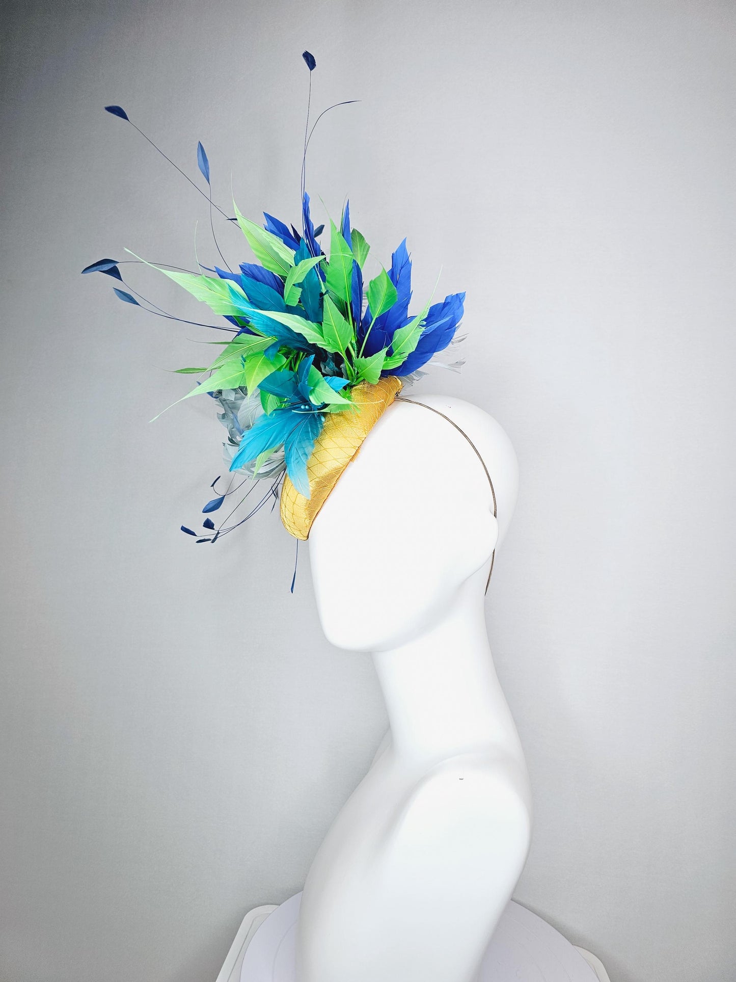 kentucky derby hat fascinator colorful yellow satin with netting light blue feather flower emerald green royal turquoise blue feathers