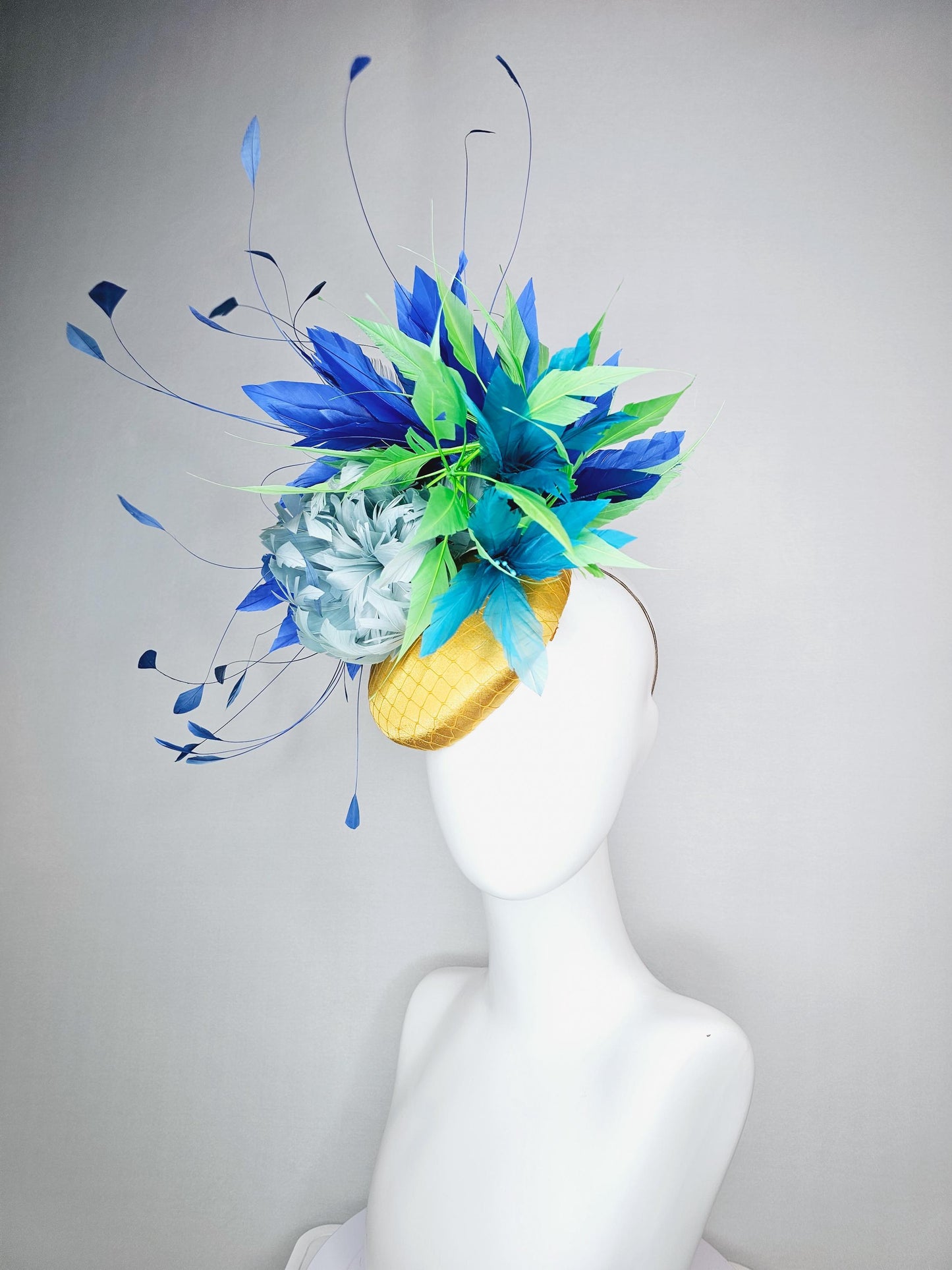 kentucky derby hat fascinator colorful yellow satin with netting light blue feather flower emerald green royal turquoise blue feathers