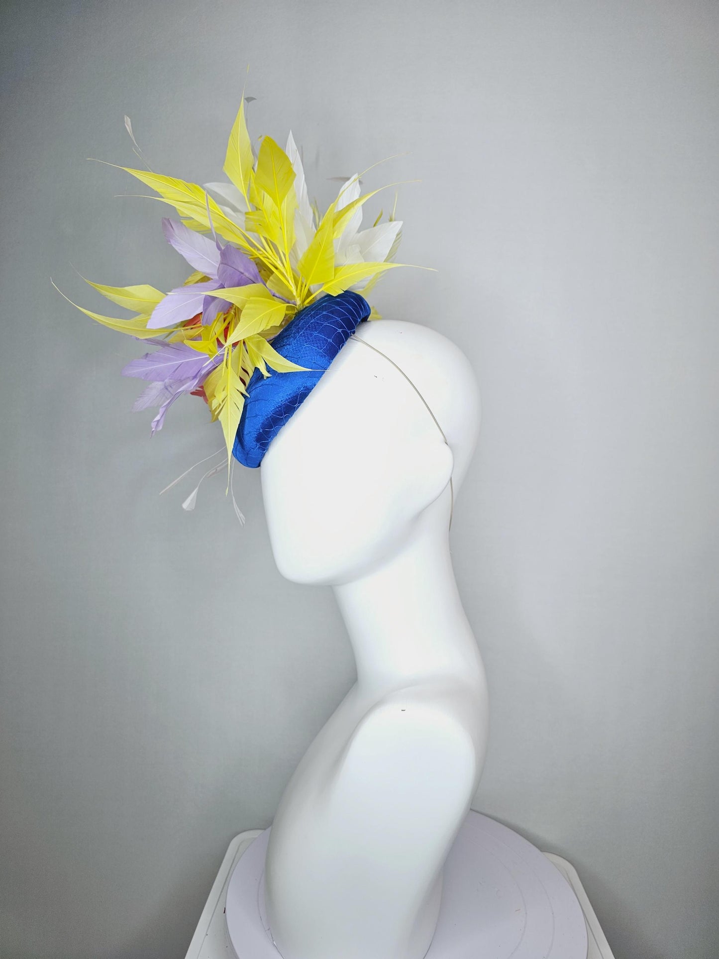 kentucky derby hat fascinator royal blue satin with netting orange feather flower colorful white yellow lavender purple branching feathers